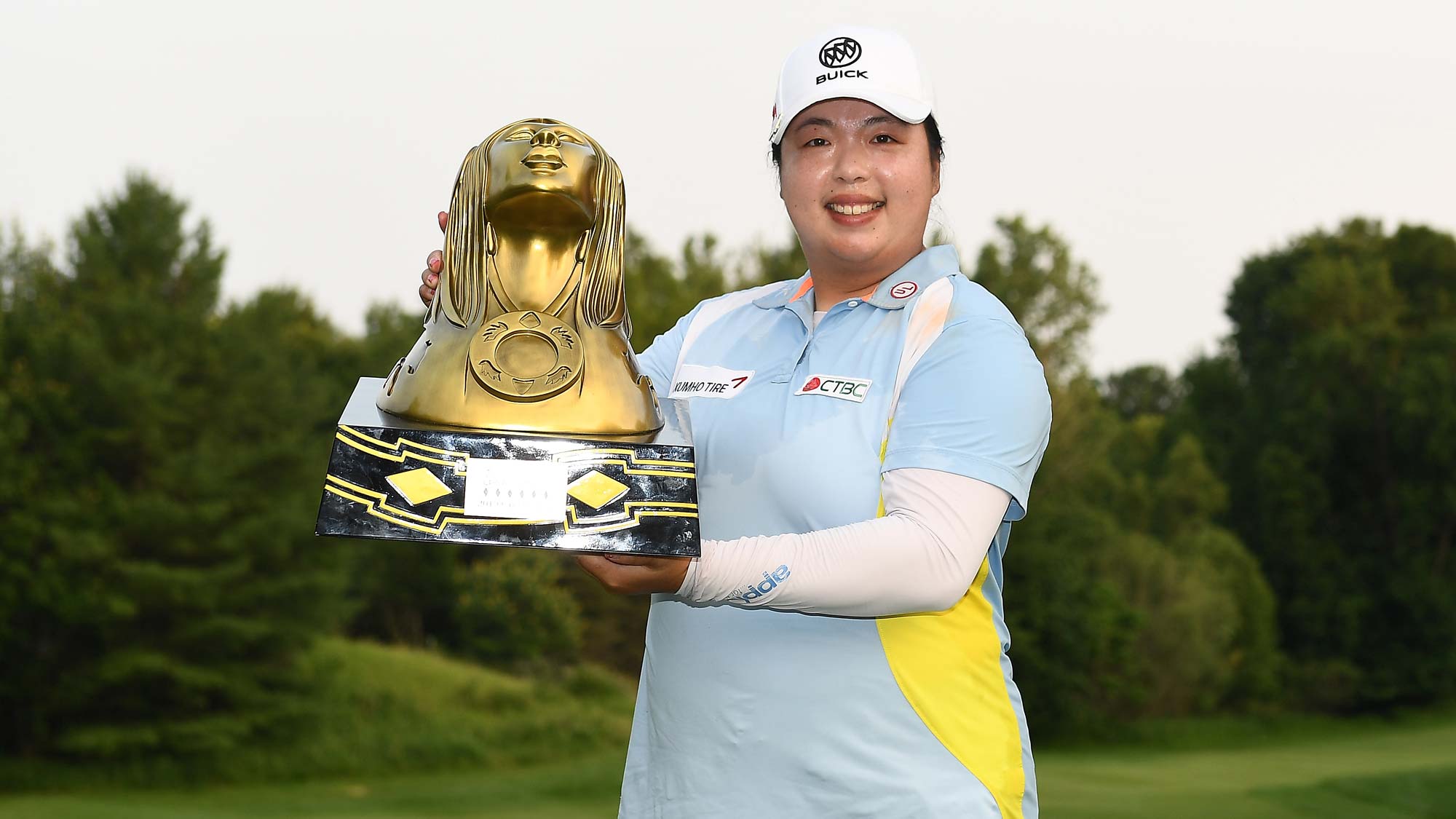 Shanshan Feng of China poses with the trophy after winning the Thornberry Creek LPGA Classic