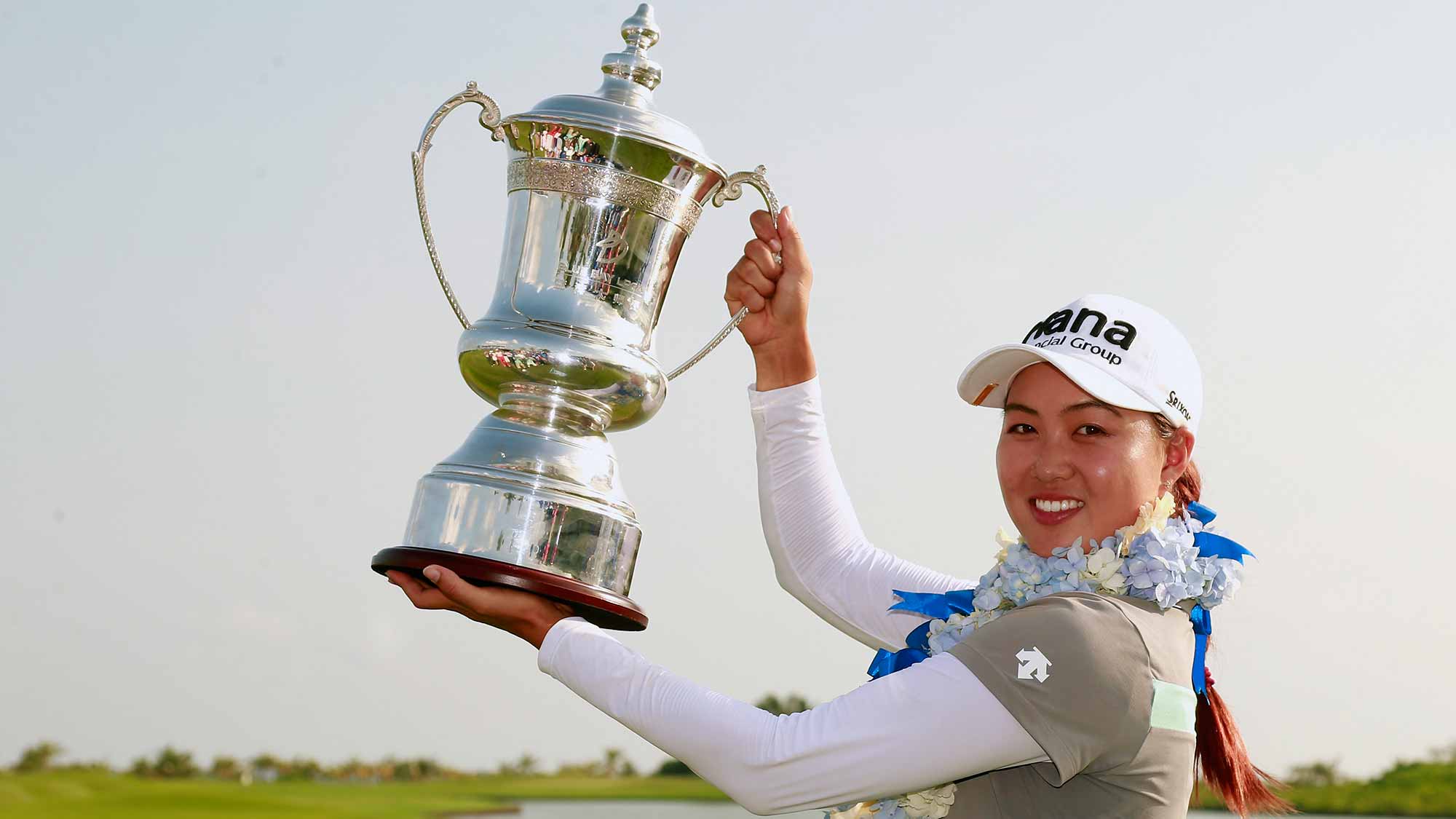 Minjee Lee of Australia poses with her trophy after winning the Blue Bay LPGA on Day 4