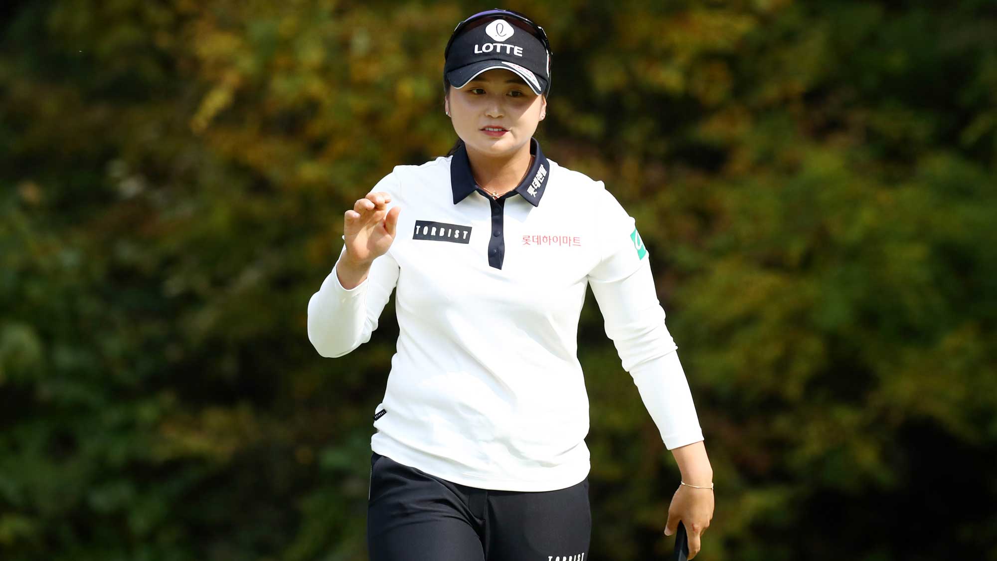 Hye-Jin Choi of South Korea acknowledges the gallery after the birdie on the 7th green during the final round of the BMW Ladies Championship