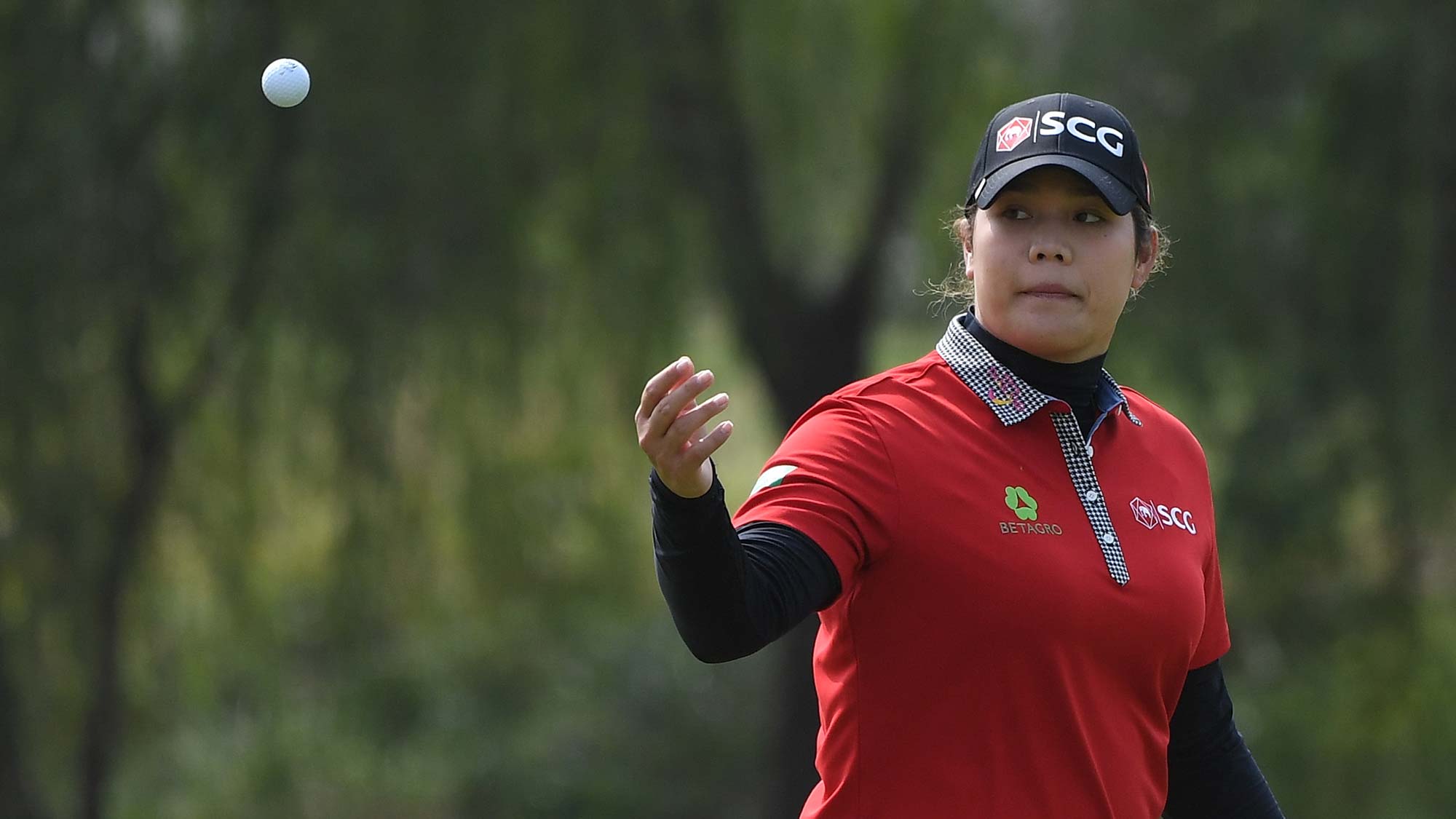 Ariya Jutanugarn of Thailand plays a shot during the first round of the Buick LPGA Shanghai