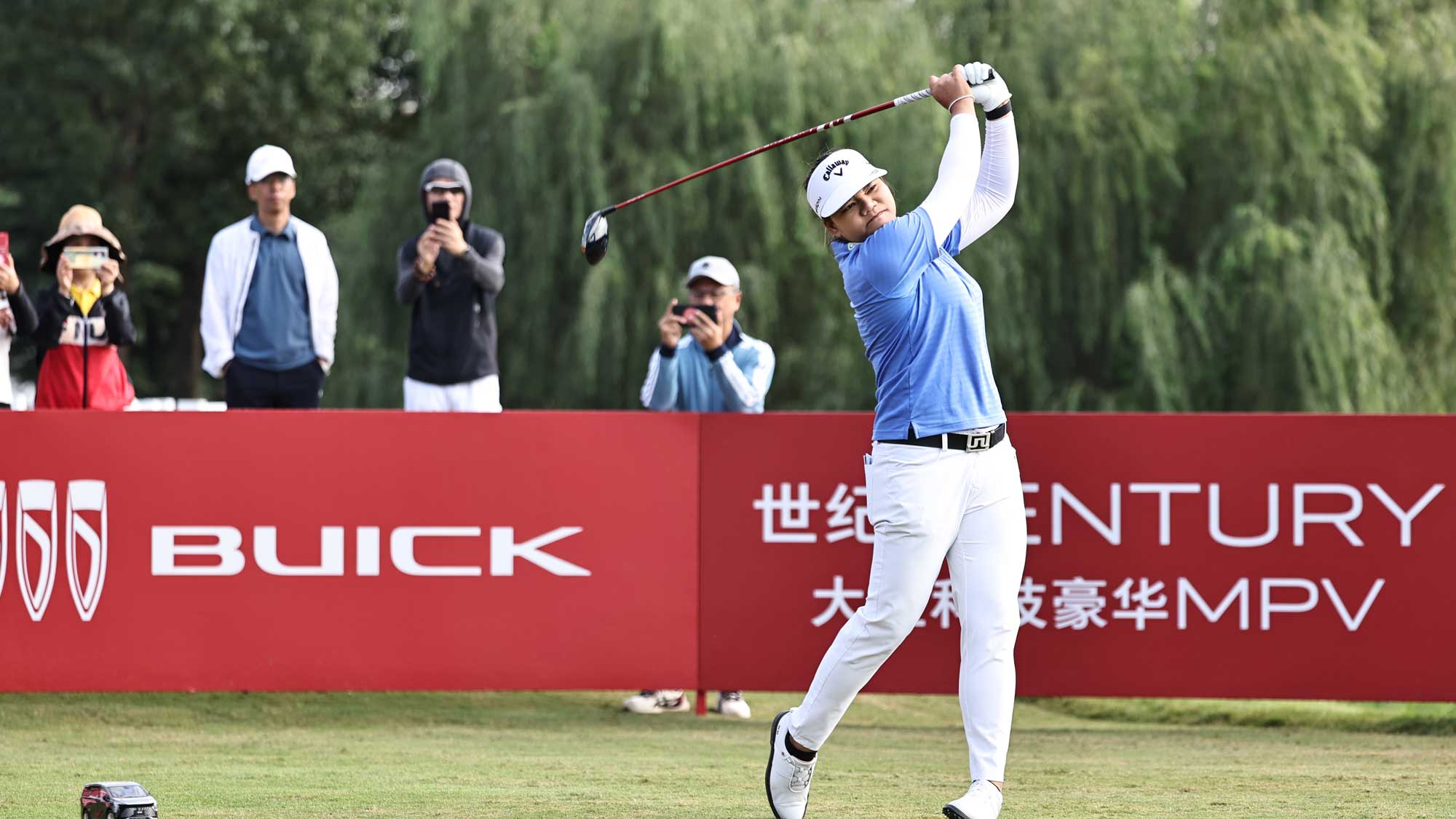 Wichanee Meechai of Thailand hits a tee shot on the first hole during the first round of the Buick LPGA Shanghai at Shanghai Qizhong Garden Golf Club on October 12, 2023 in Shanghai, China. 