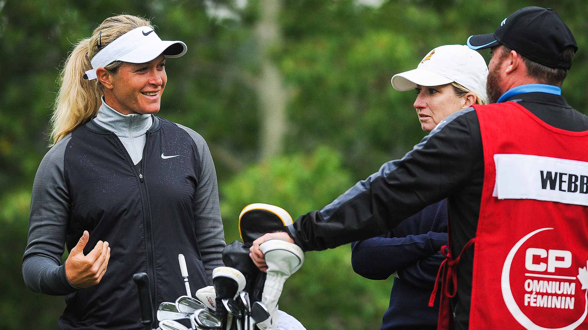 Suzann Pettersen of Norway talks with Karrie Webb of Australia prior to teeing off on the 11th hole during the first round of the Canadian Pacific Women's Open at Priddis Greens Golf and Country Club