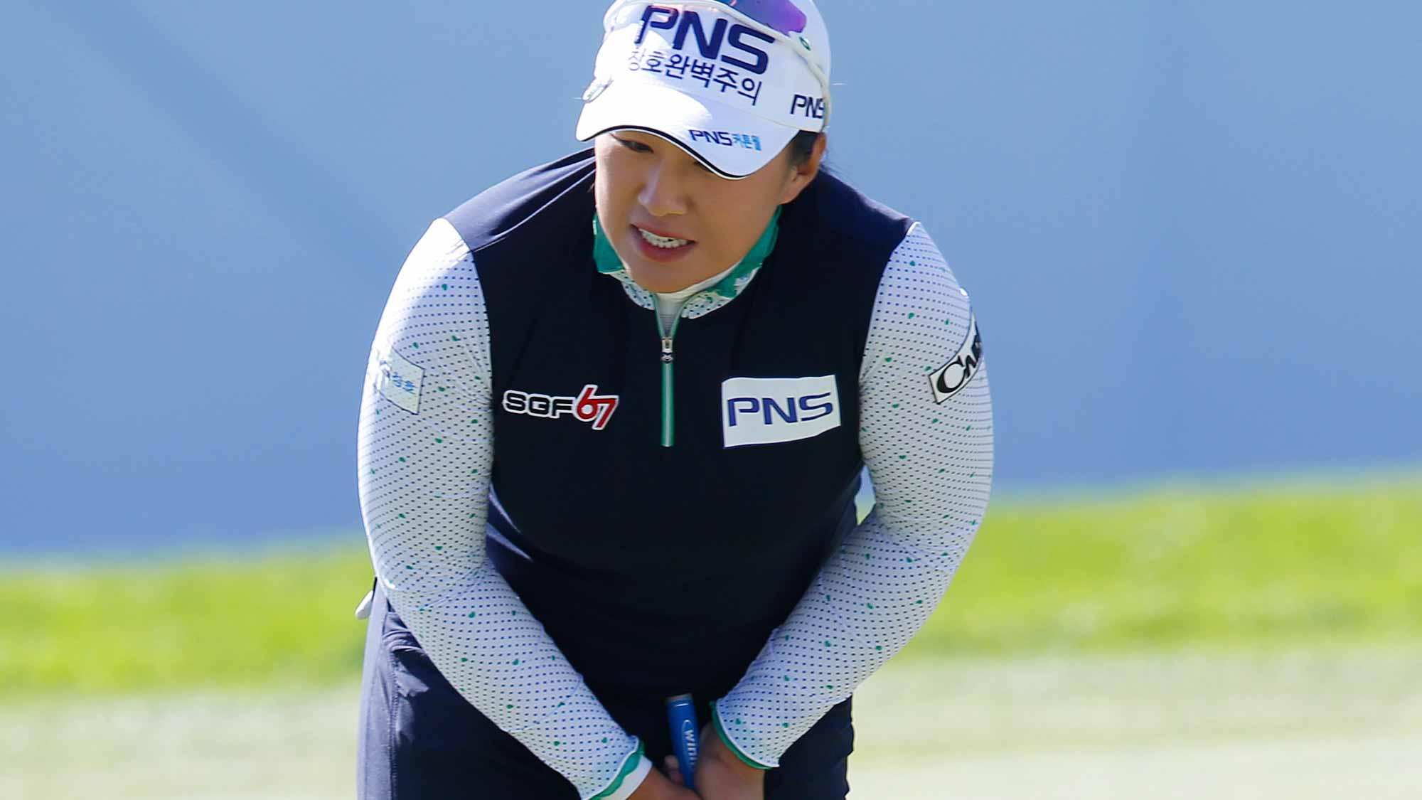 Amy Yang of South Korea reacts to her put on the 18th green during the second round of the Canadian Pacific Women's Open at Priddis Greens Golf and Country Club
