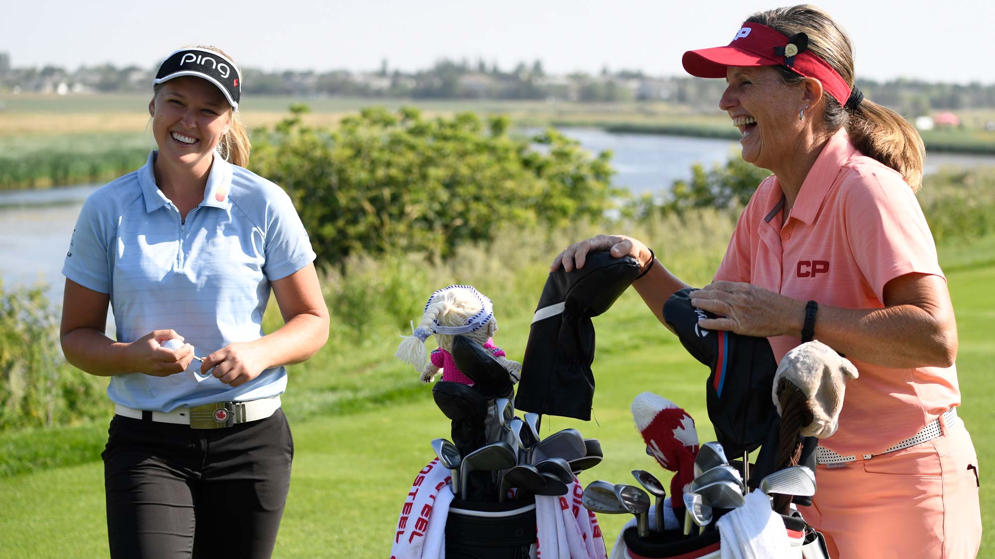 Brooke Henderson and Lorie Kane talk during the 2018 CP Women's Open ProAm