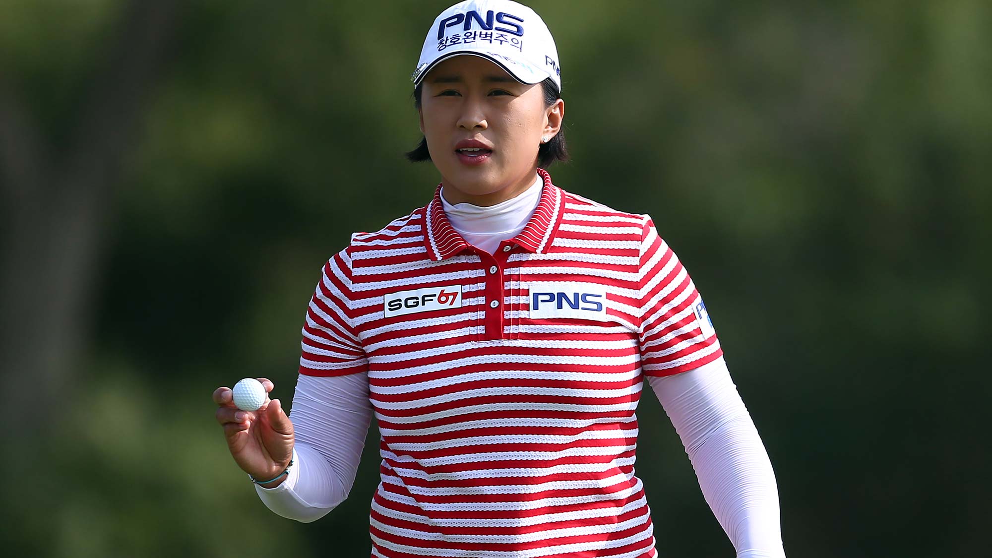 Amy Yang of Korea reacts after sinking her putt on the 16th green during the second round of the CP Womens Open