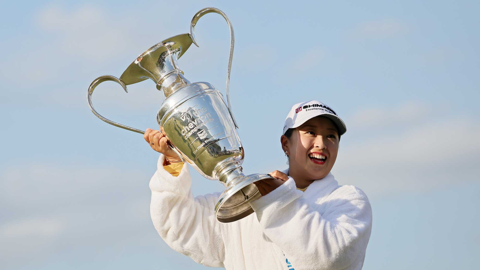 Mao Saigo of Japan poses with the trophy after winning The Chevron Championship 2025 in a playoff at The Club at Carlton Woods on April 27, 2025 in The Woodlands, Texas.
