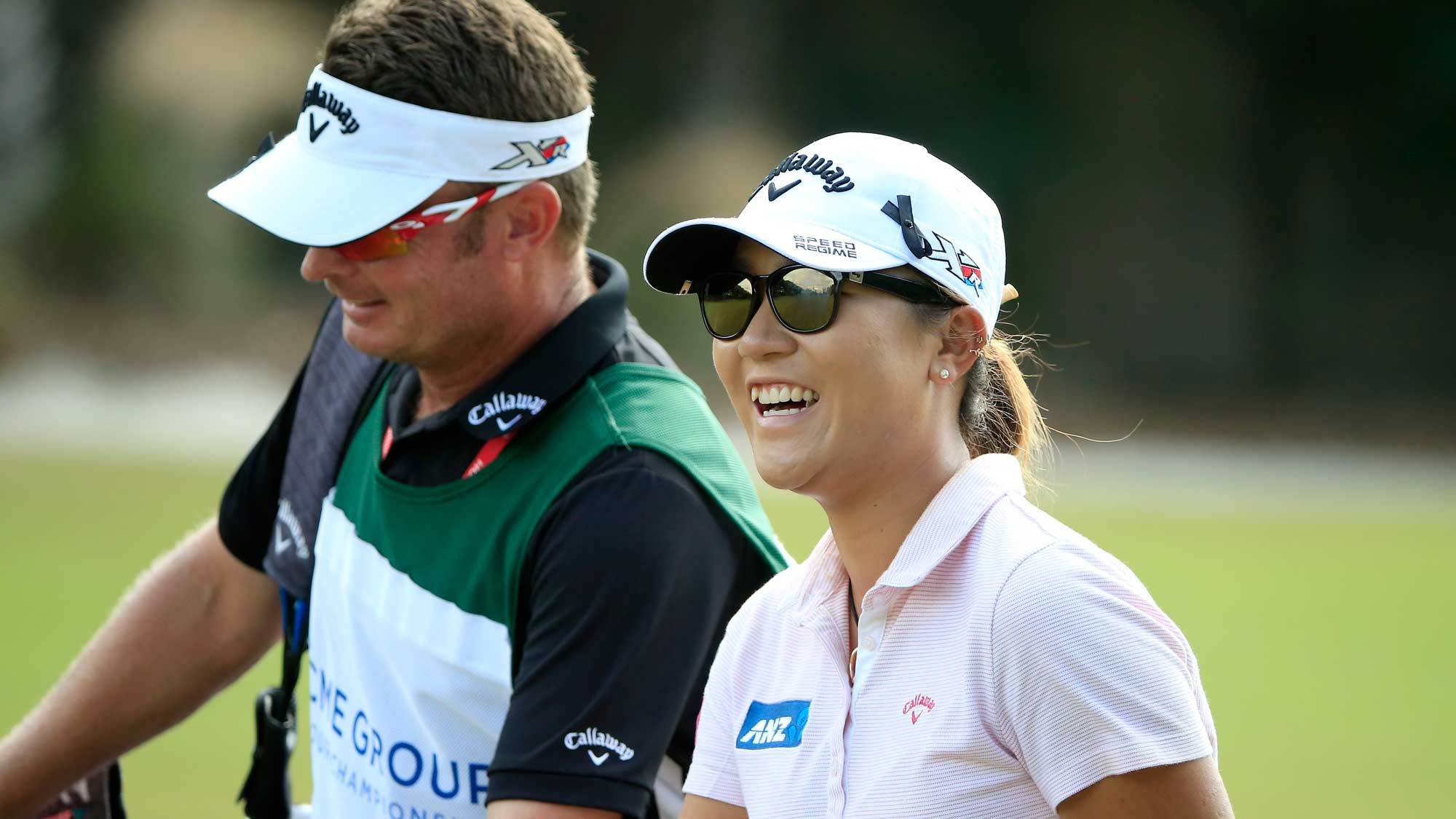 Lydia Ko of New Zealand smiles as she walks down the second hole during the second round of the CME Group Tour Championship at Tiburon Golf Club