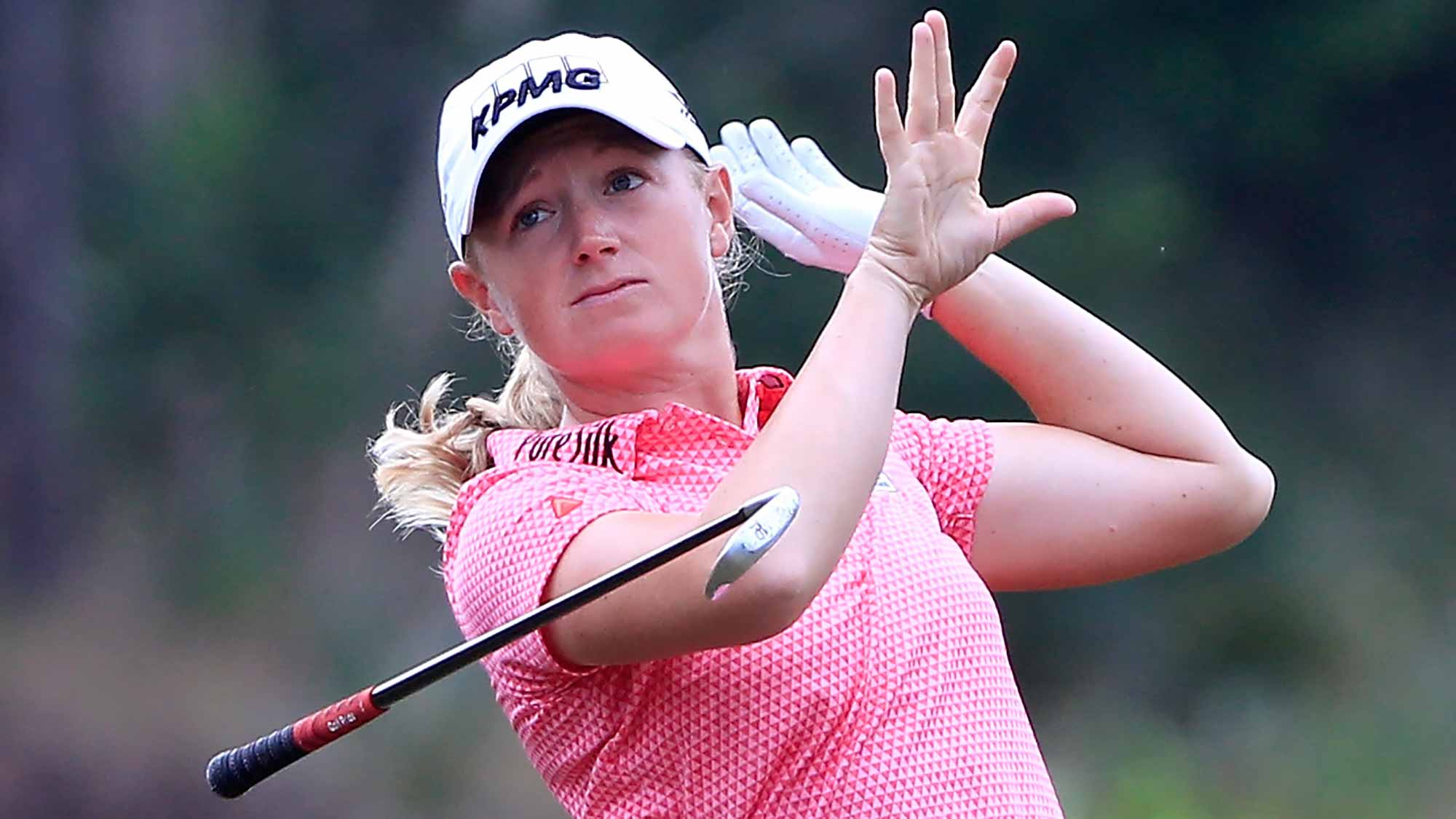 Stacy Lewis of the United States loses her club after a shot on the third hole during the third round of the CME Group Tour Championship at Tiburon Golf Club