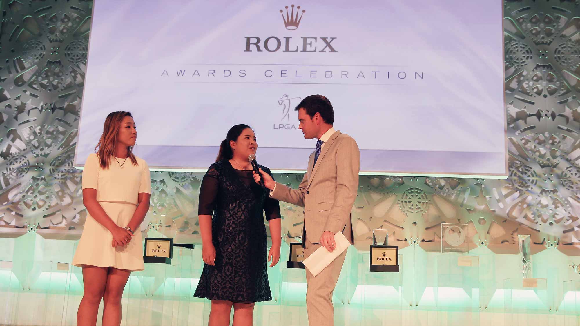 Tom Abbott of Golf Channel chats on stage with Lydia Ko of New Zealand (L) and Inbee Park of South Korea (C) during the LPGA Rolex Players Awards at the Ritz-Carlton, Naples