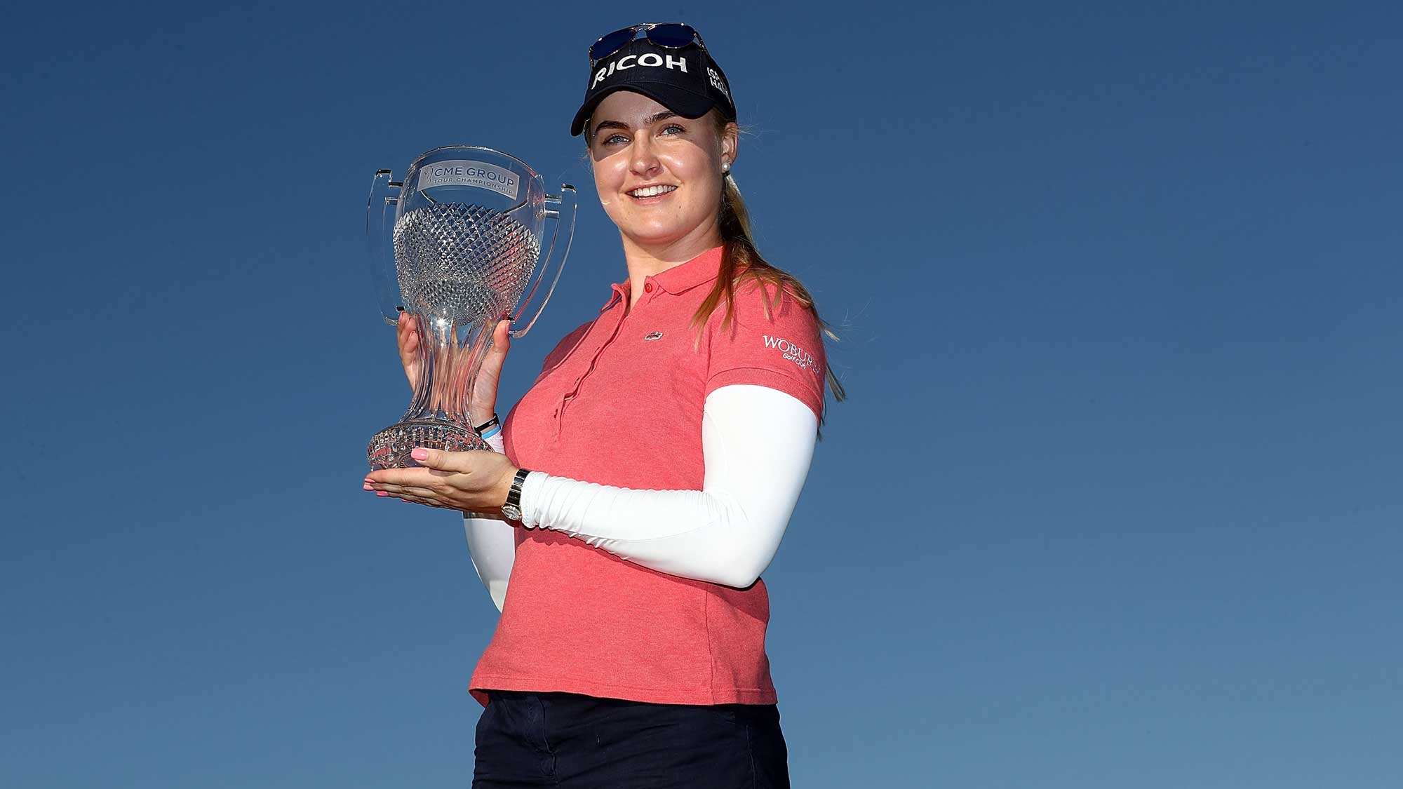 Charley Hull of England poses with the CME Tour Championship trophy during the final round of the CME Group Tour Championship at Tiburon Golf Club
