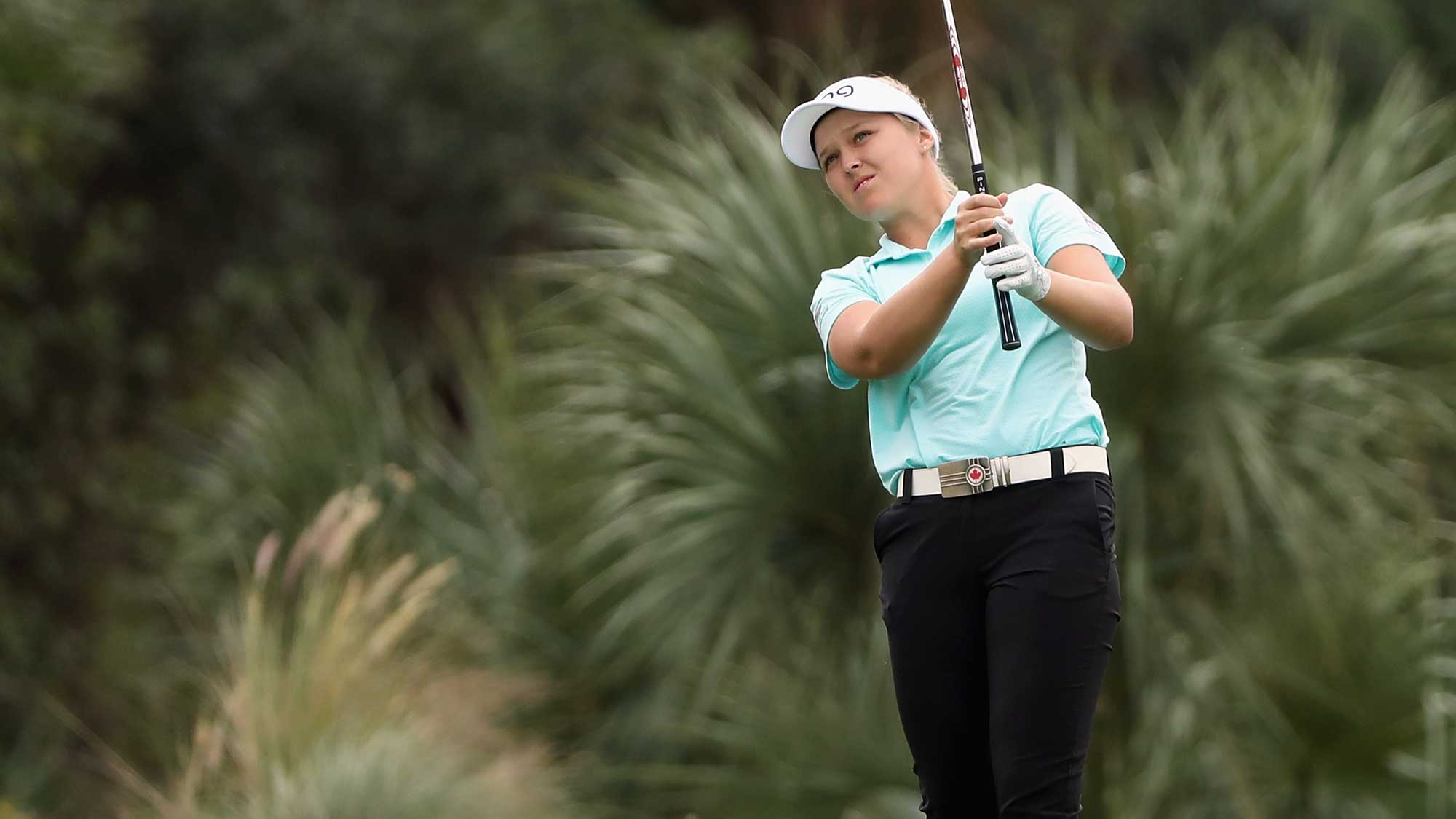 Brooke Henderson of Canada plays a shot on the second hole during round one of the CME Group Tour Championship