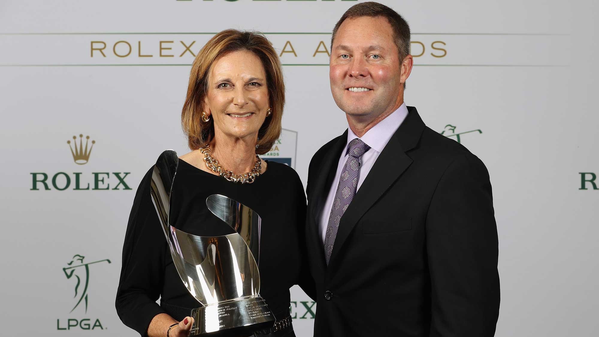 Commissioners Award recipient Roberta Bowman poses with LPGA Tour commissioner Mike Whan during the LPGA Rolex Players Awards at The Ritz-Carlton Golf Resort