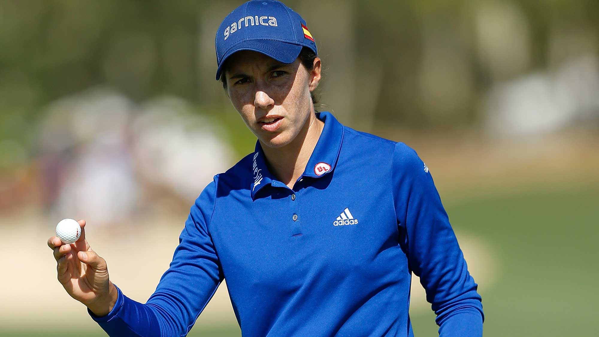 Carlota Ciganda of Spain reacts after a putt on the ninth green during the first round of the CME Group Tour Championship