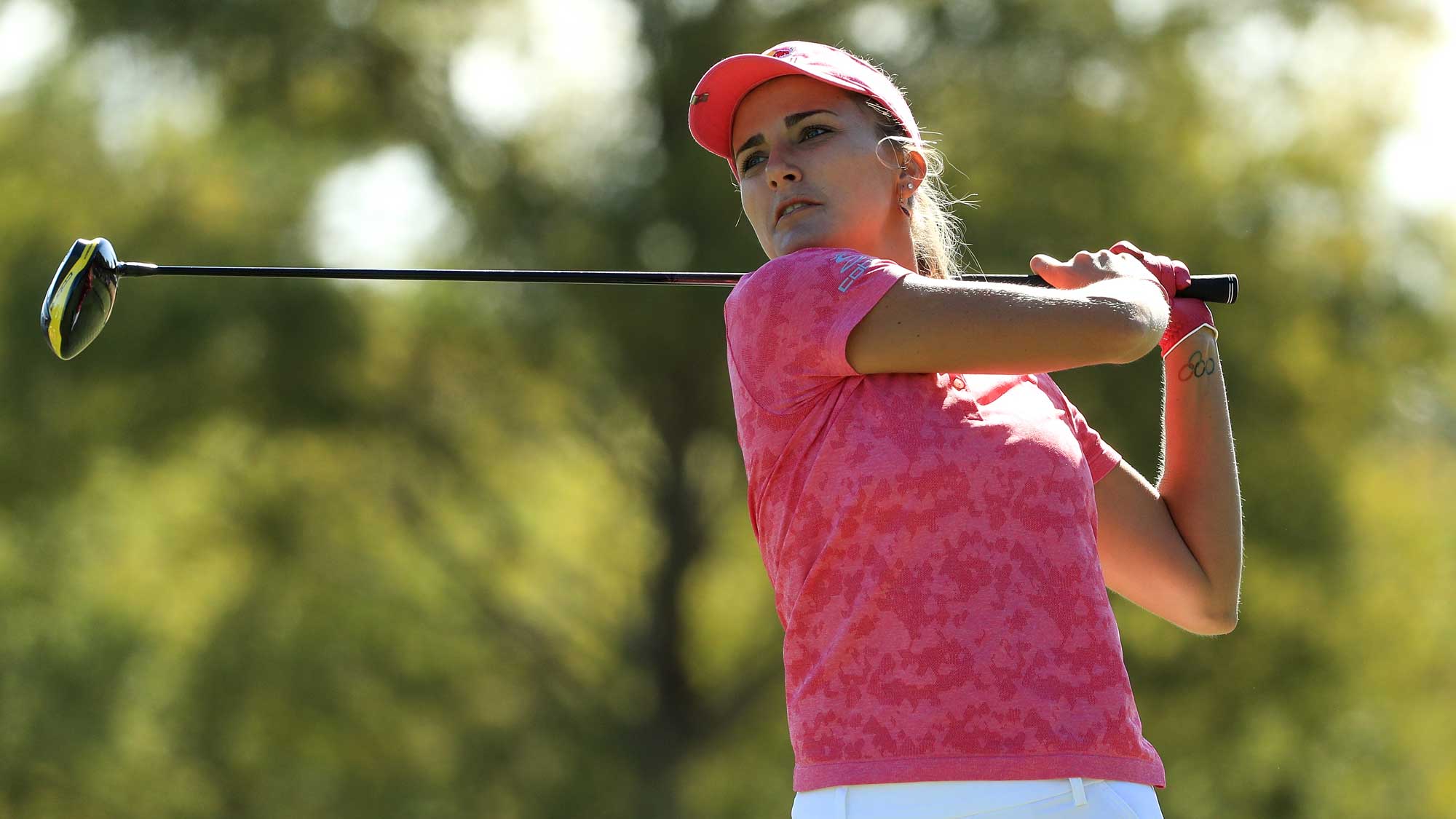 Lexi Thompson plays her shot from the third tee during the third round of the LPGA CME Group Tour Championship