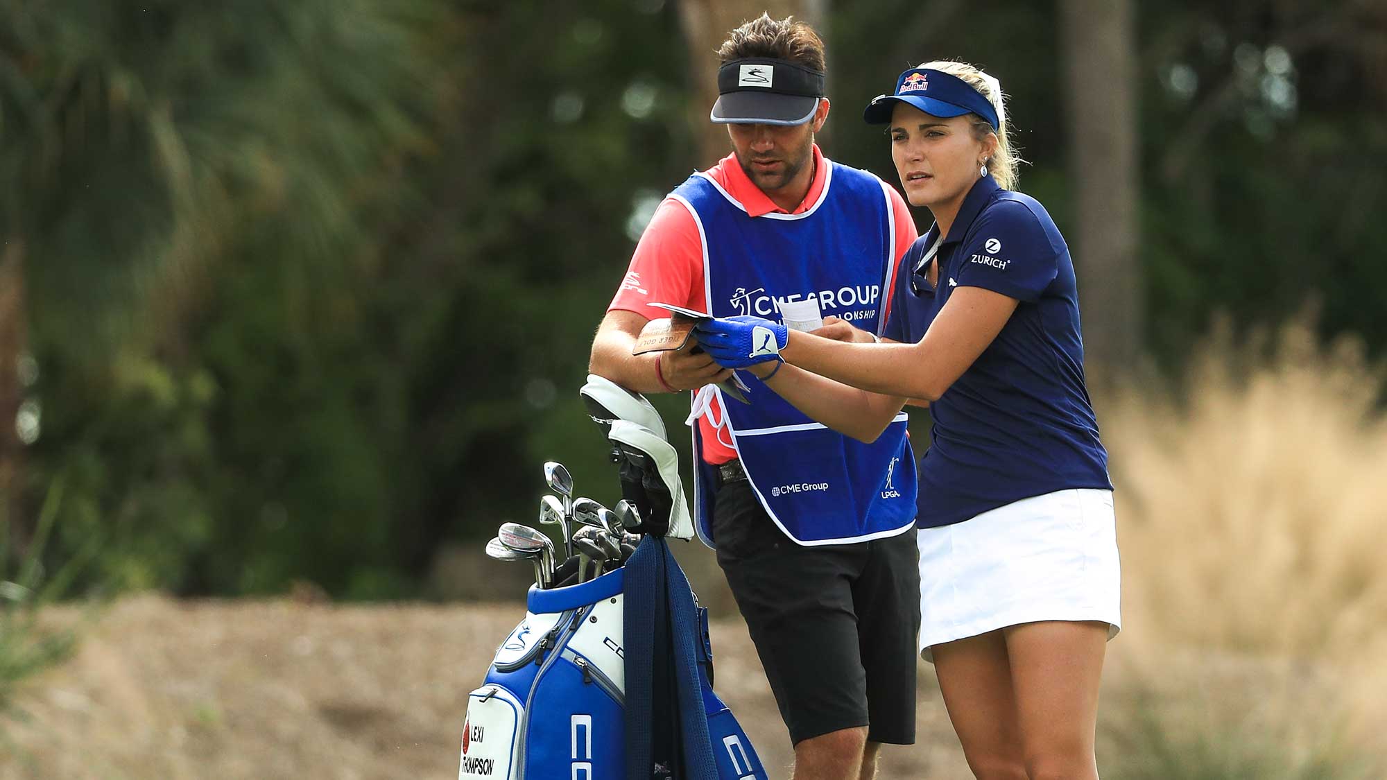 Lexi Thompson talks with her caddie on the second hole during the final round of the LPGA CME Group Tour Championship