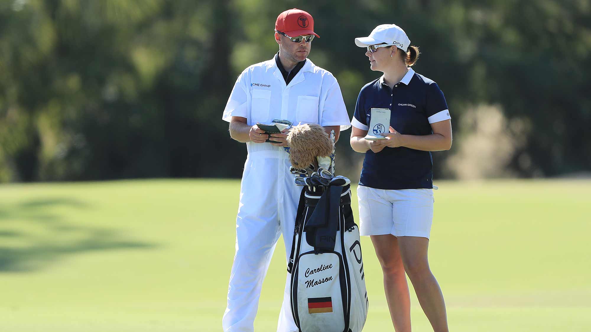  Caroline Masson of Germany talks with her caddie on the second hole during the second round of the CME Group Tour Championship at Tiburon Golf Club on November 22, 2019 in Naples, Florida
