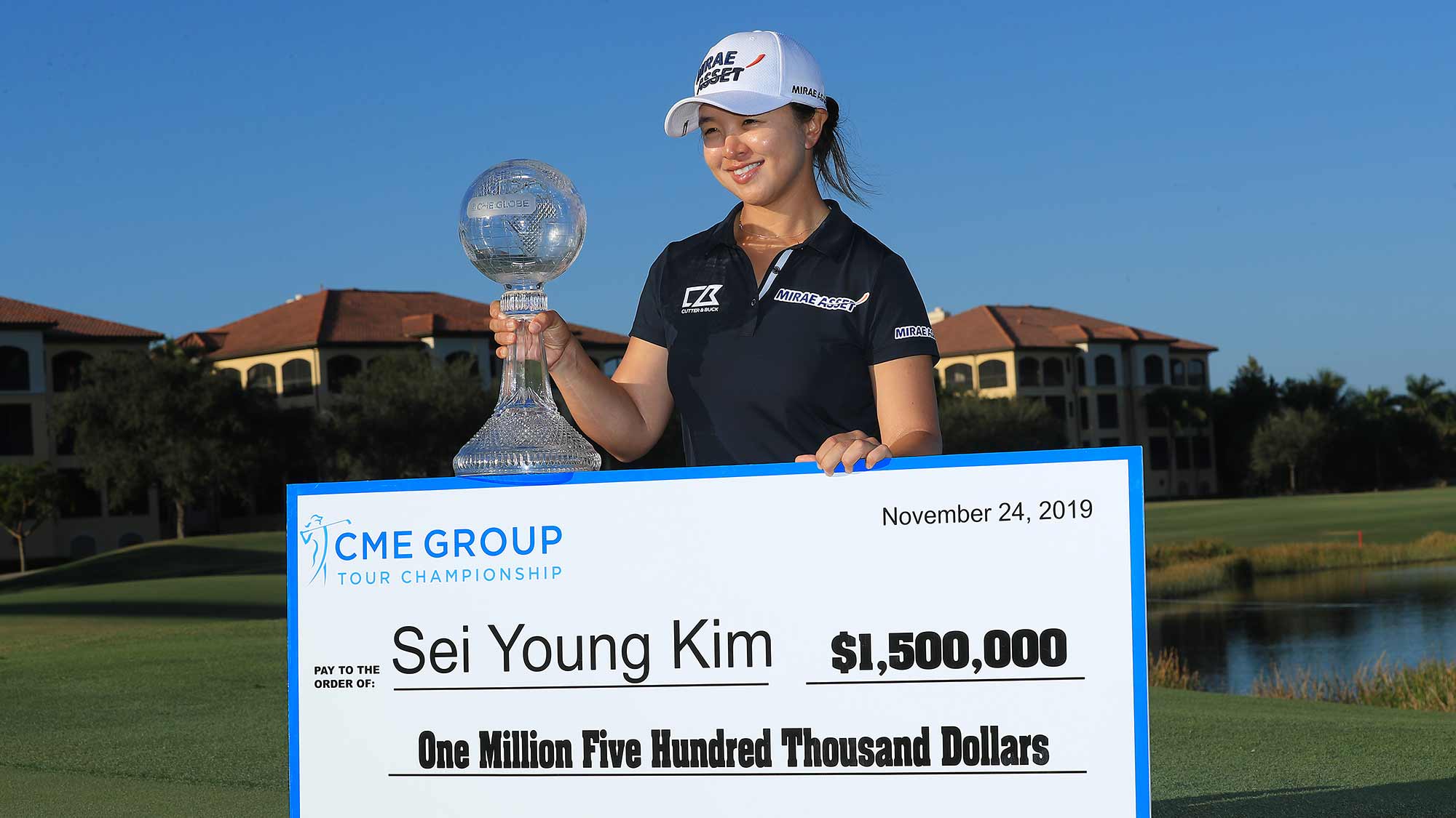 Sei Young Kim of South Korea poses with the CME Globe trophy and winner's check after winning the CME Group Tour Championship at Tiburon Golf Club on November 24, 2019 in Naples, Florida.