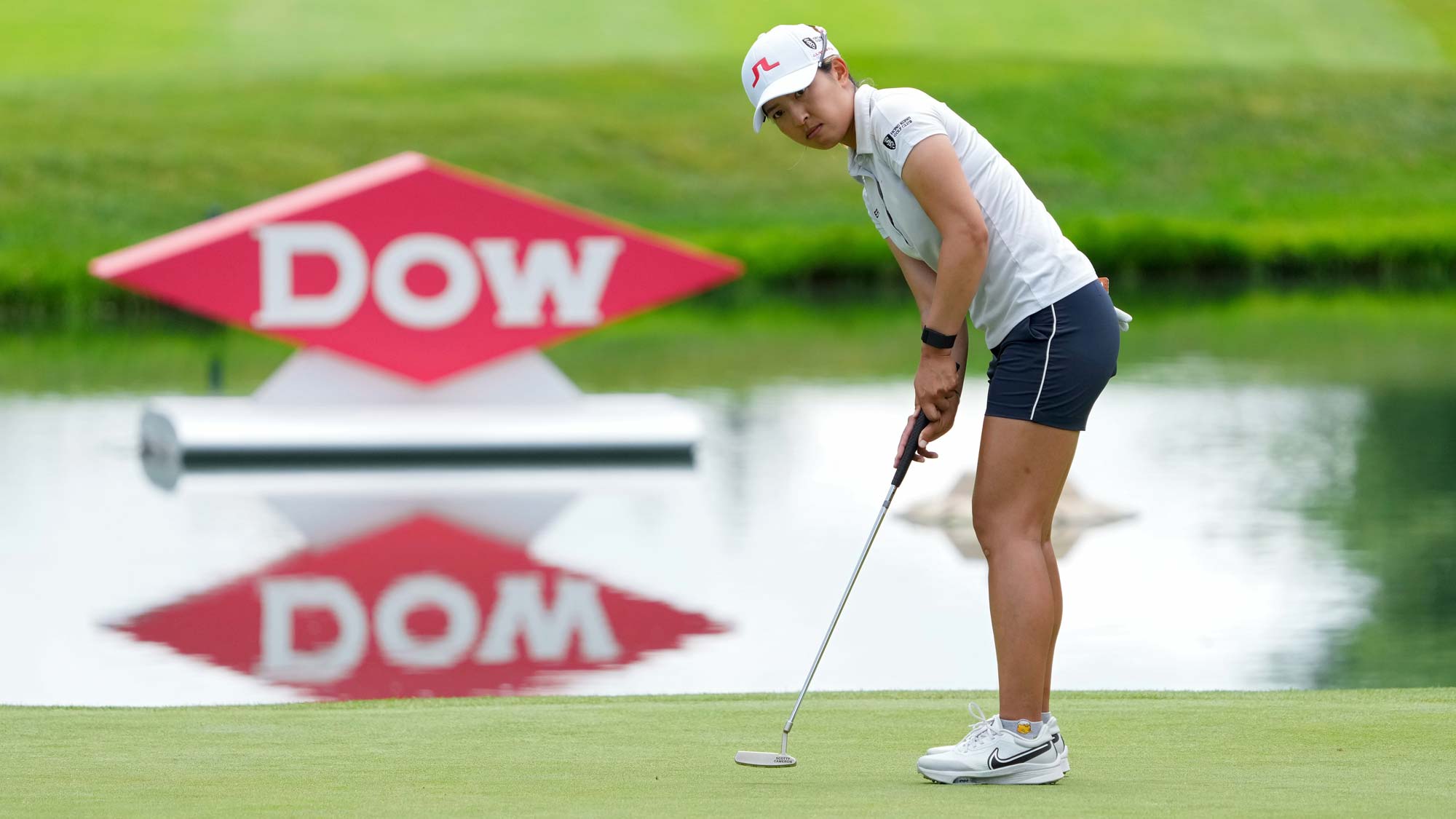 Tiffany Chan of Hong Kong putts on the fifth green during the final round of the Dow Great Lakes Bay Invitational