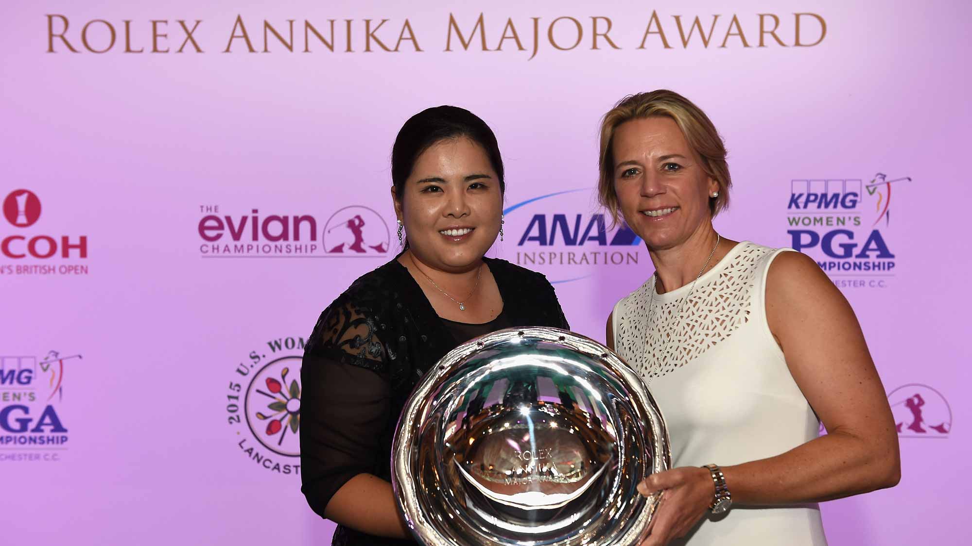 Inbee Park presented with the Rolex Annika Major Award by Annika Sorestam at the Rolex Award ceremony after the third round of the Evian Championship