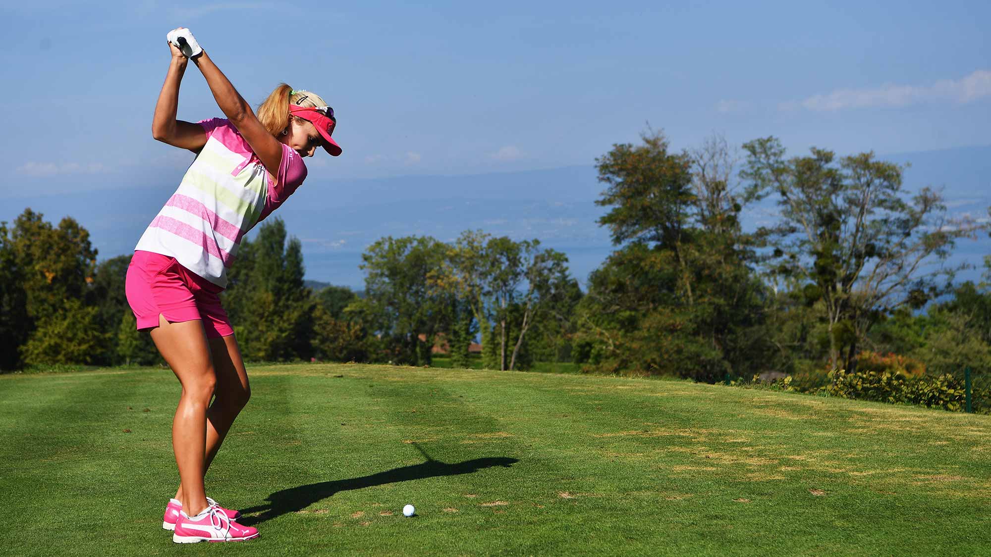 Lexi Thompson of USA plays a shot during practice prior to the start of the Evian Championship