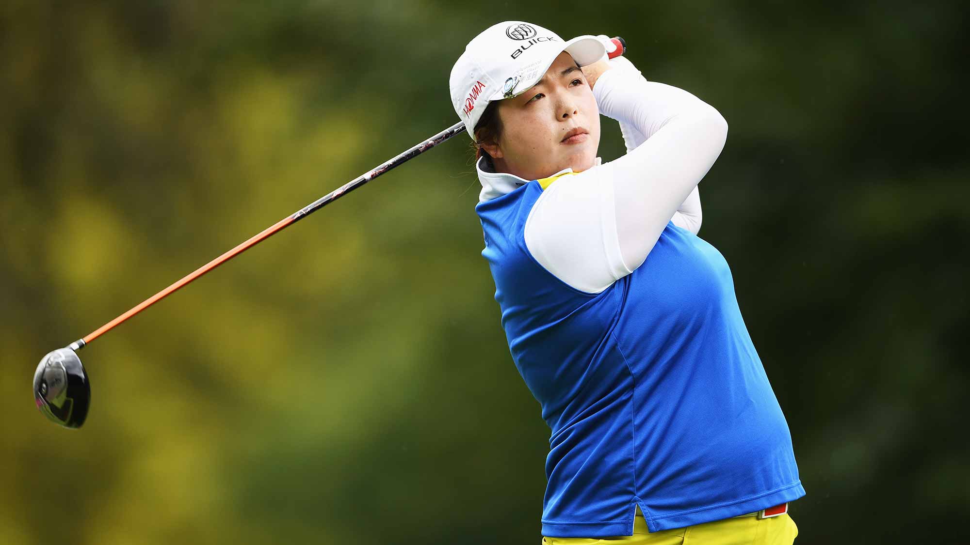 Shanshan Feng of China plays a shot during the first round of The Evian Championship