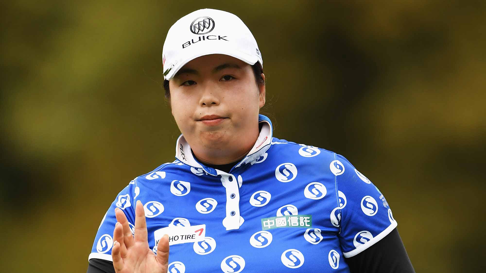 Shanshan Feng of China reacts to a putt during the second round of The Evian Championship
