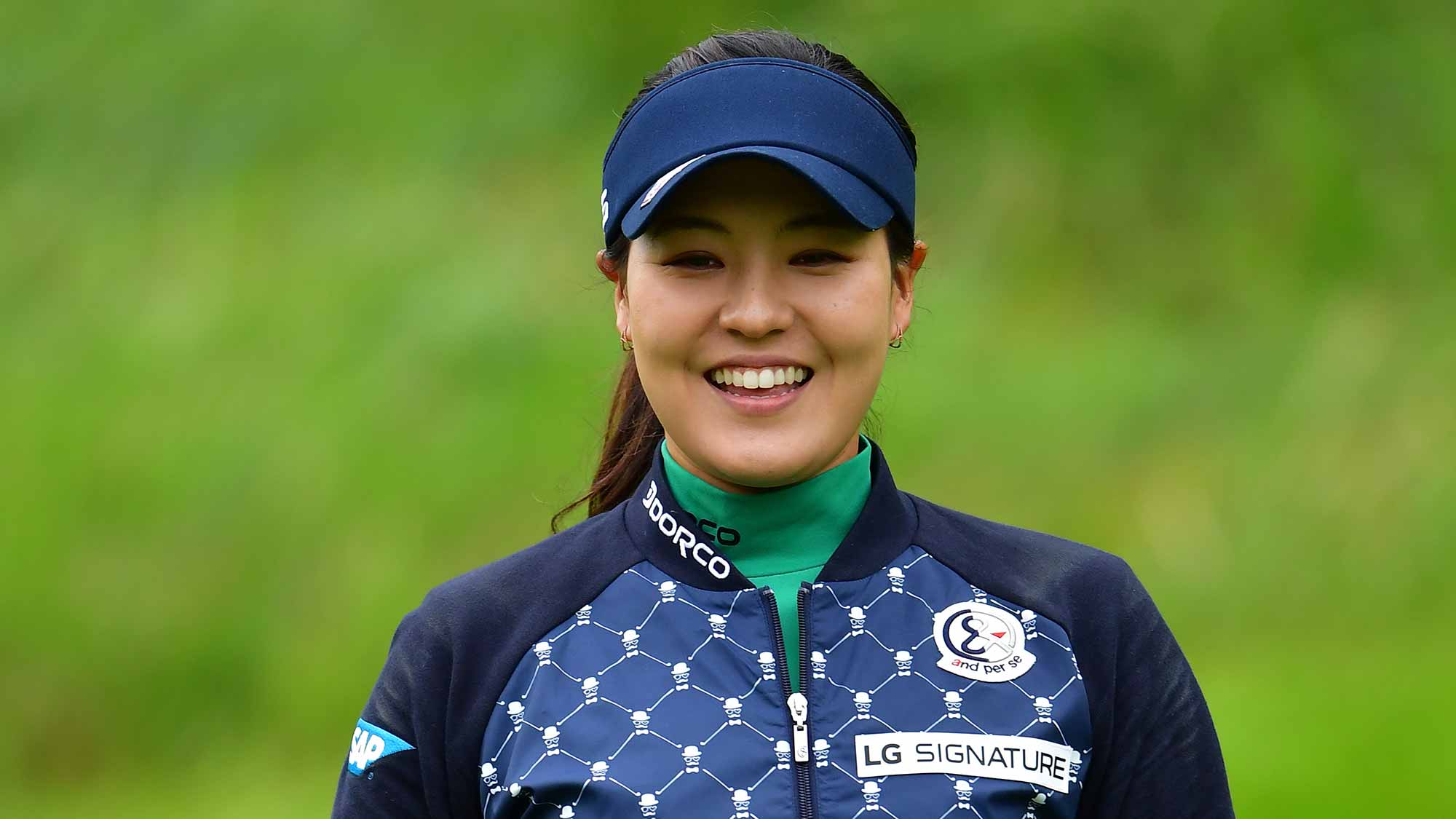 Defending Champion In Gee Chun of South Korea waves during the pro-am prior to the start of the Evian Championship at Evian Resort Golf Club