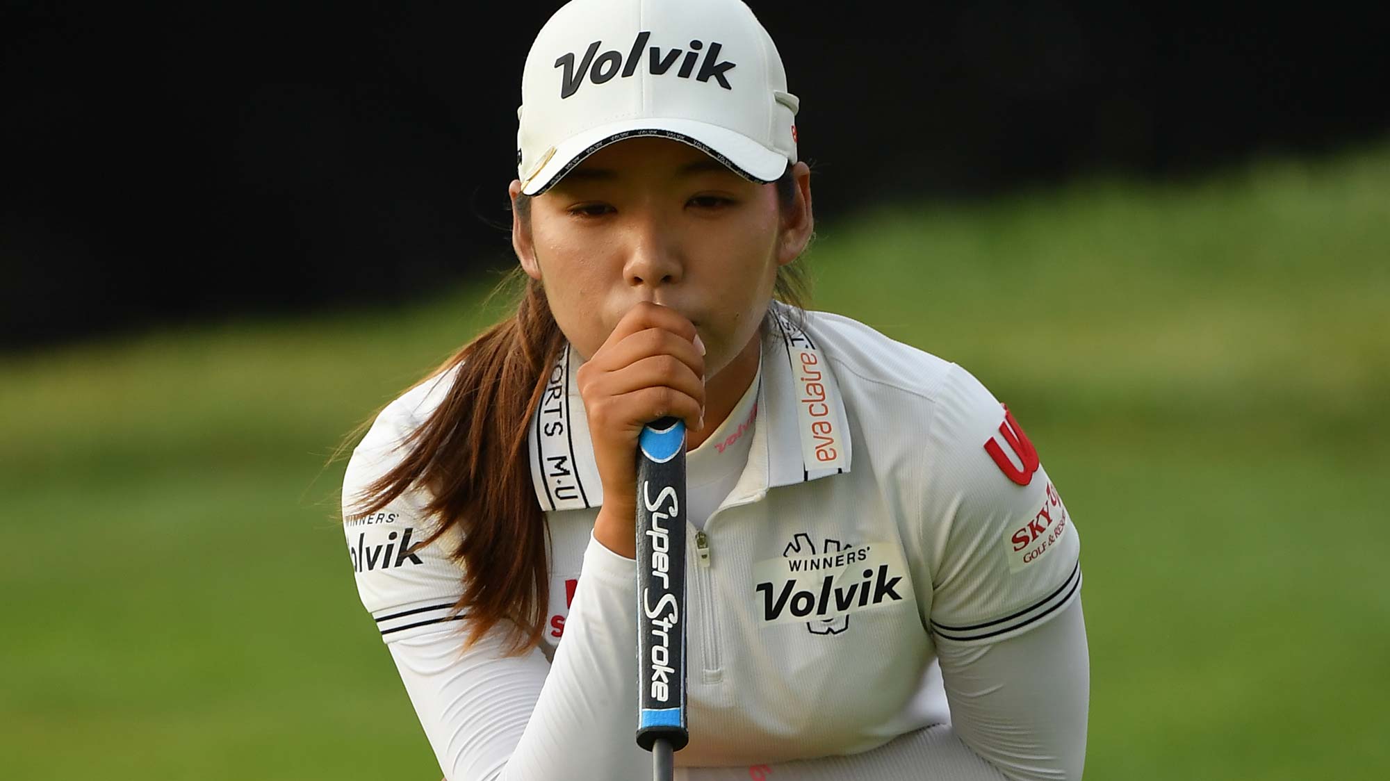 Mi Hyang Lee of Korean lines up a putt during day 1 of the Evian Championship
