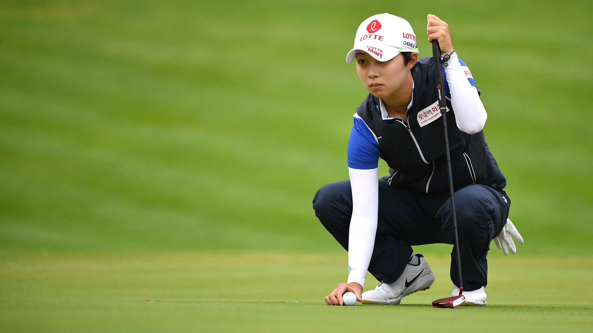 Hyo Joo Kim of South Korea lines up her putt on the 13th green during day 4 of the Evian Championship