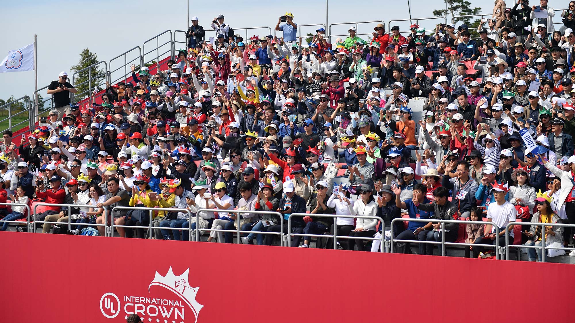 Fans watch on the stand on day four of the UL International Crown