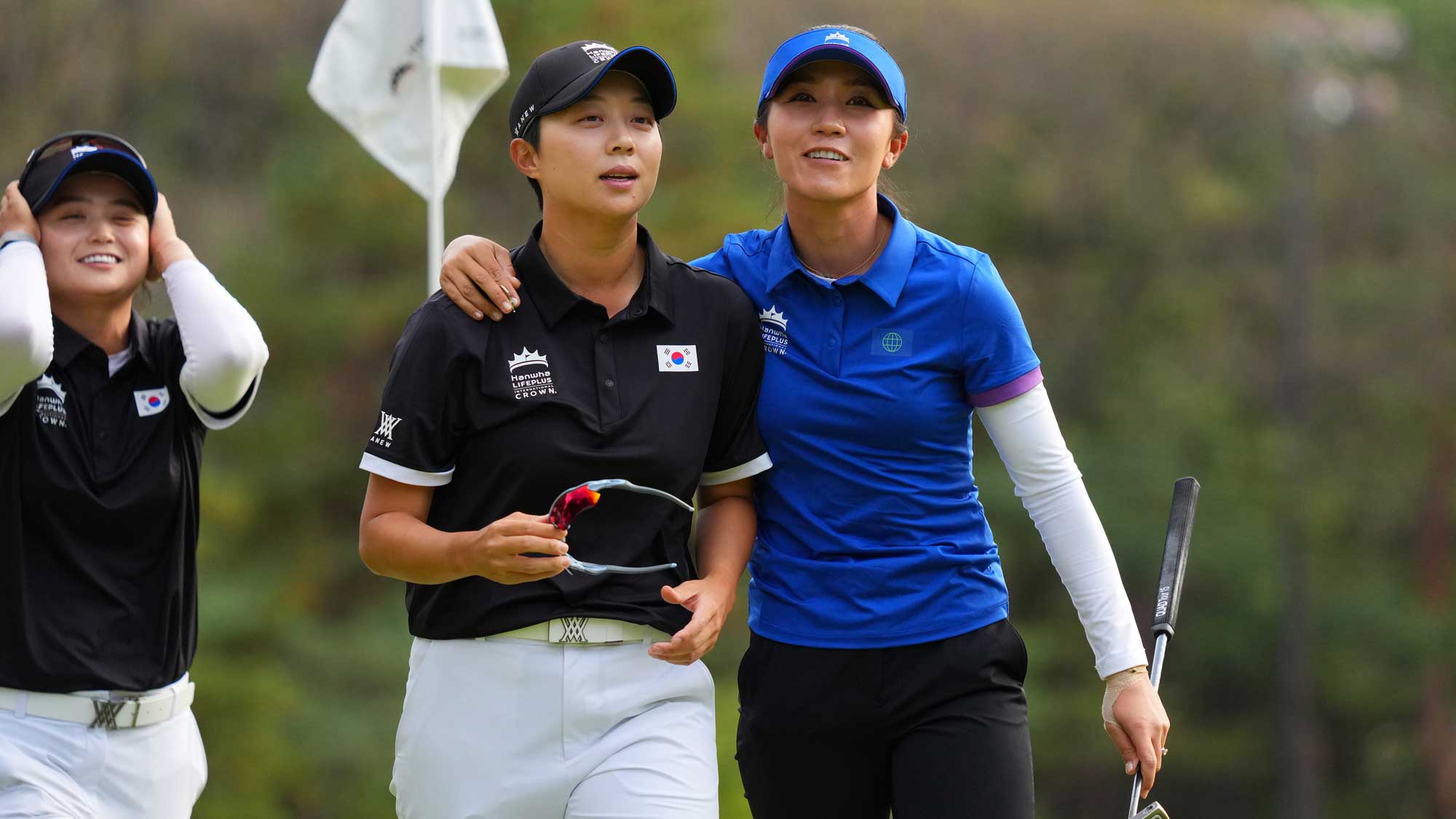 Hyo Joo Kim of Republic of Korea Team (L) and Lydia Ko of the World Team (R)