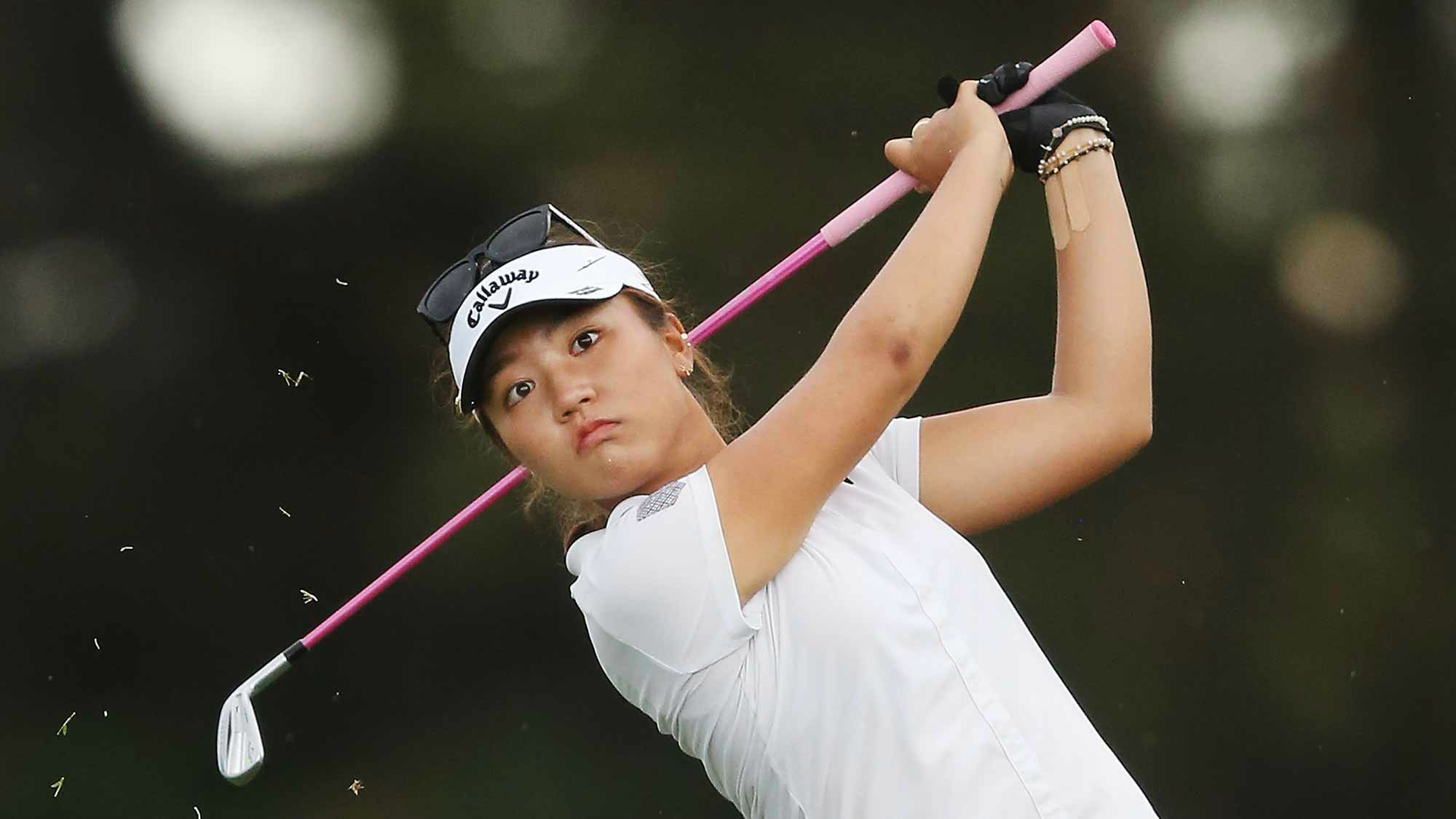 Lydia Ko of New Zealand hits an approach shot on the 12th hole during day f...