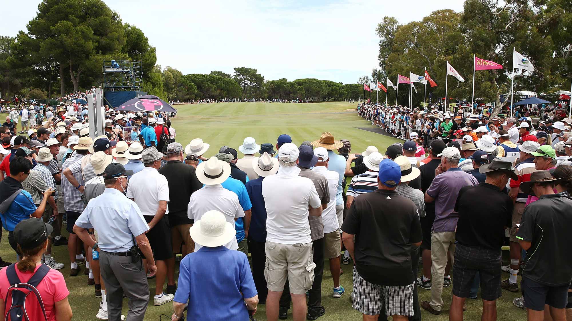 Spectators look on as Lydia Ko of New Zealand tees off during day two of the ISPS Handa Women's Australian Open at The Grange GC