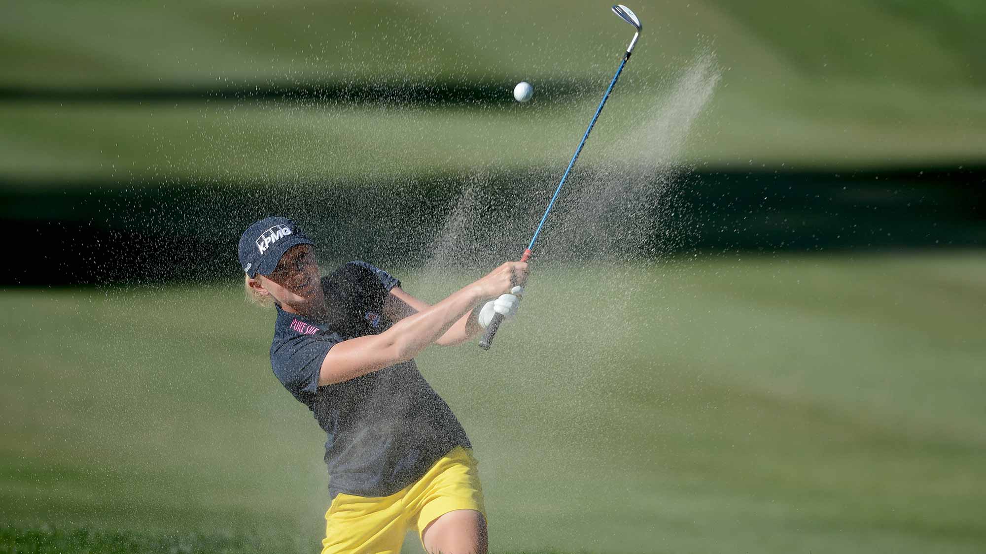 Stacy Lewis hits out of the bunker on the 15th hole during Round One of the LPGA KIA Classic at the Aviara Golf Club on March 26, 2015 in Carlsbad, California