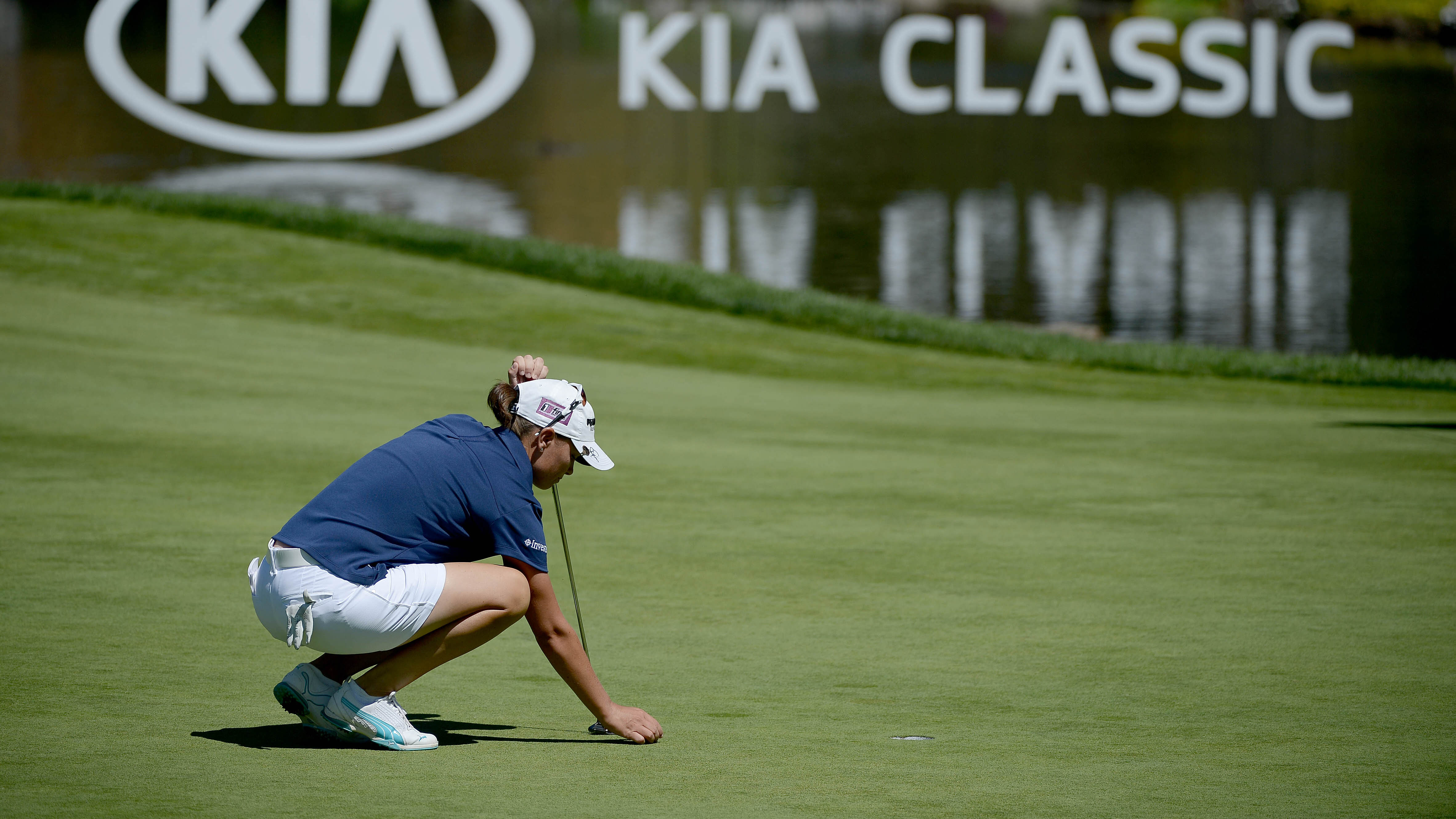 Lee-Anne Pace of South Africa lines up her putt on the 16th hole during Round One of the LPGA KIA Classic at the Aviara Golf Club on March 26, 2015 in Carlsbad, California