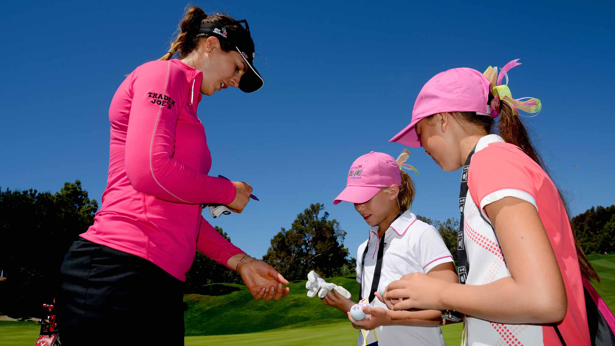 Sandra Gal of Germany signs gloves and balls for fans during Round Two of the LPGA KIA Classic at the Aviara Golf Club