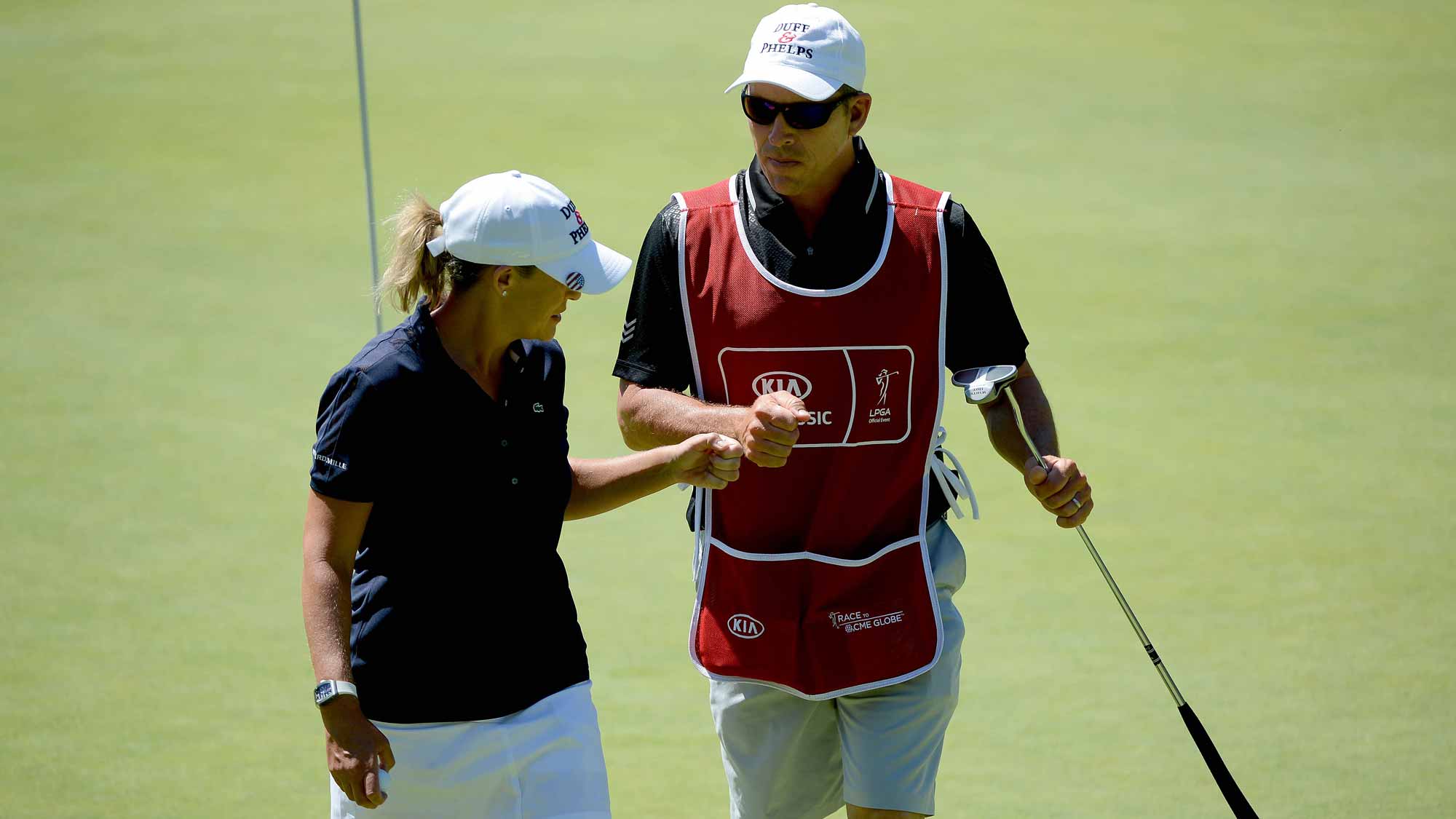 Cristie Kerr reacts to birdie putt on 8th green with caddie during Round Two of the LPGA KIA Classic at the Aviara Golf Club