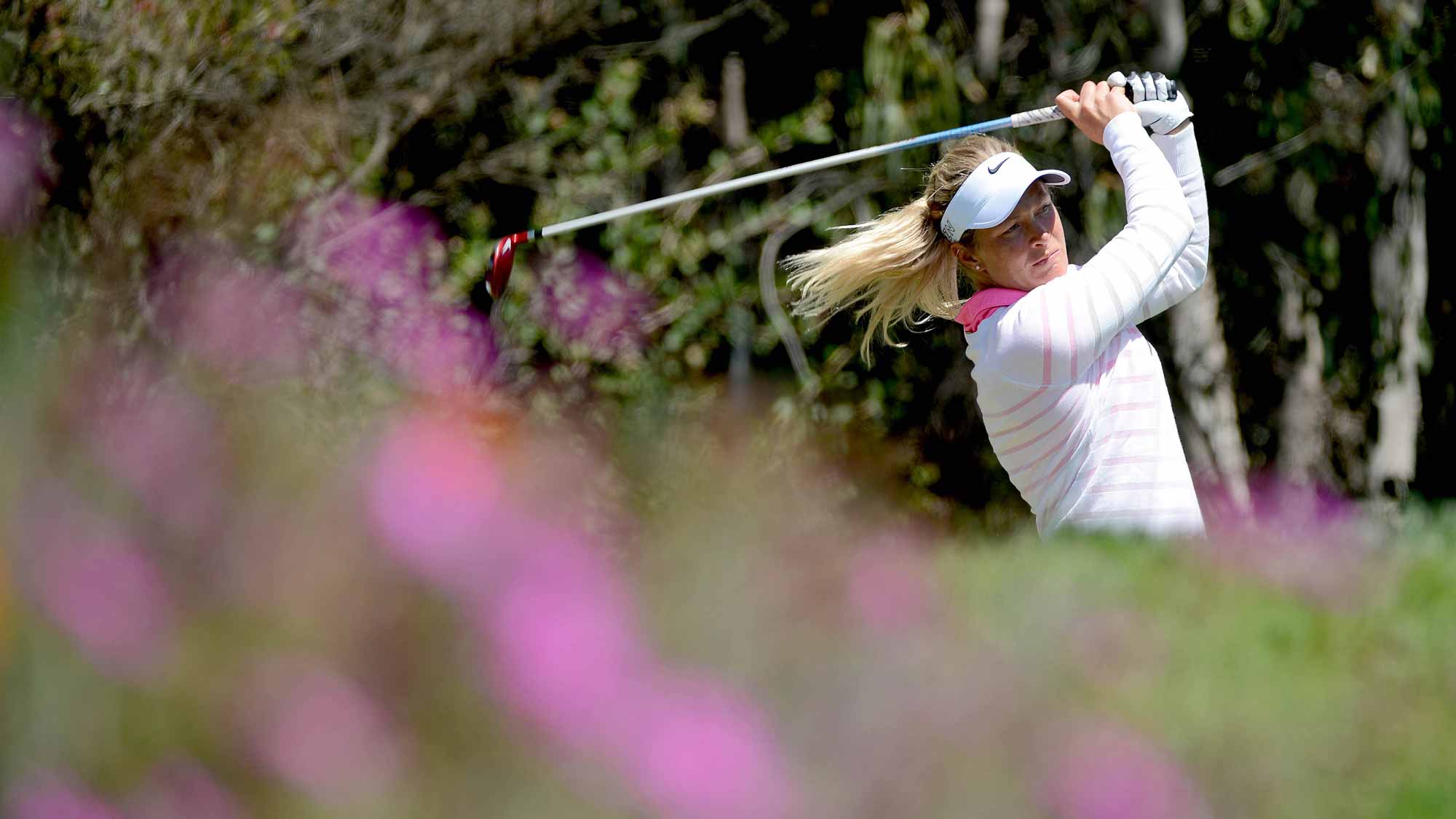 Suzann Pettersen of Norway tees off the 9th hole during Round Two of the LPGA KIA Classic at the Aviara Golf Club