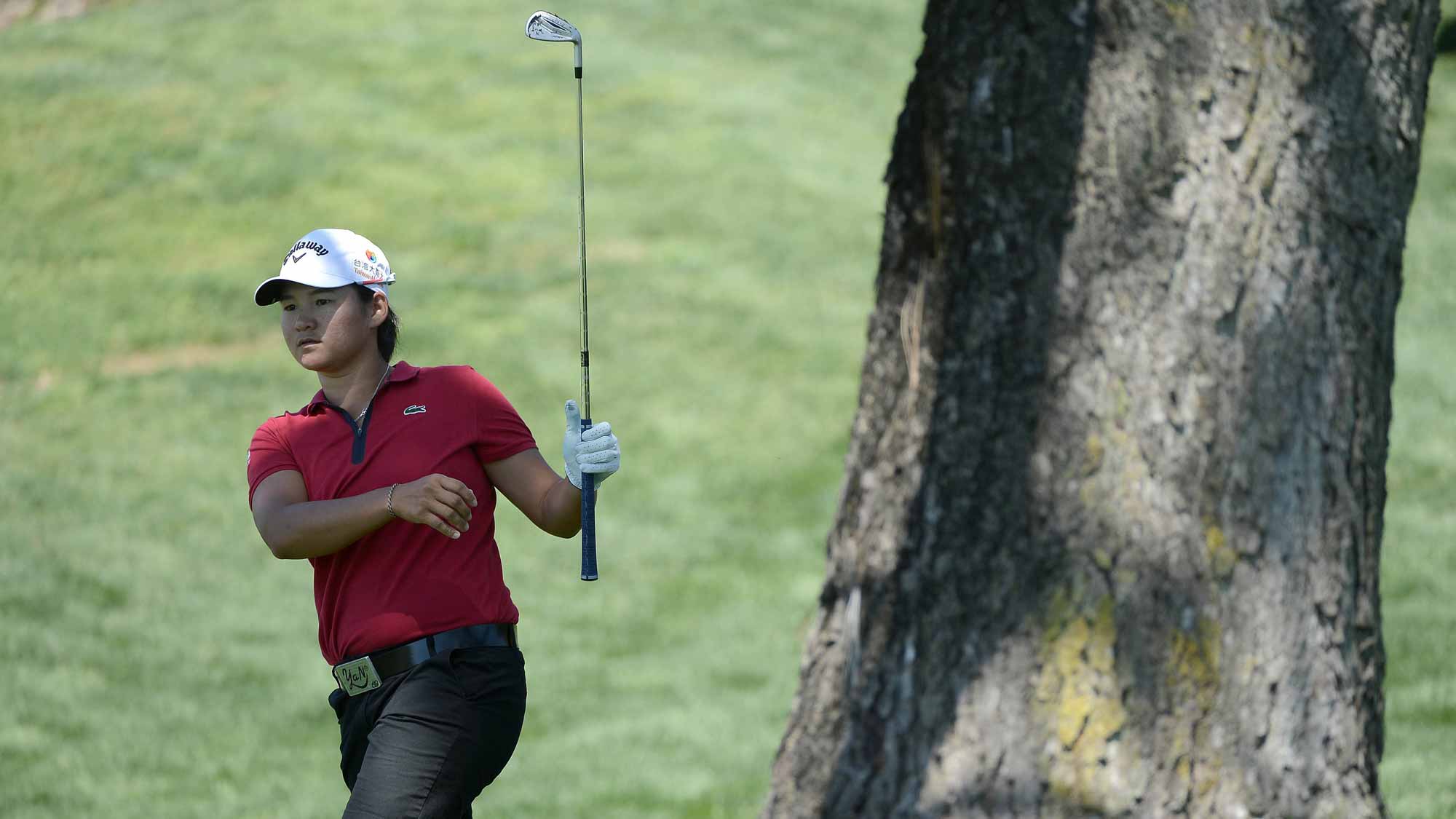 Yani Tseng of Taipei hits out from behind a tree during Round Two of the LPGA KIA Classic at the Aviara Golf Club