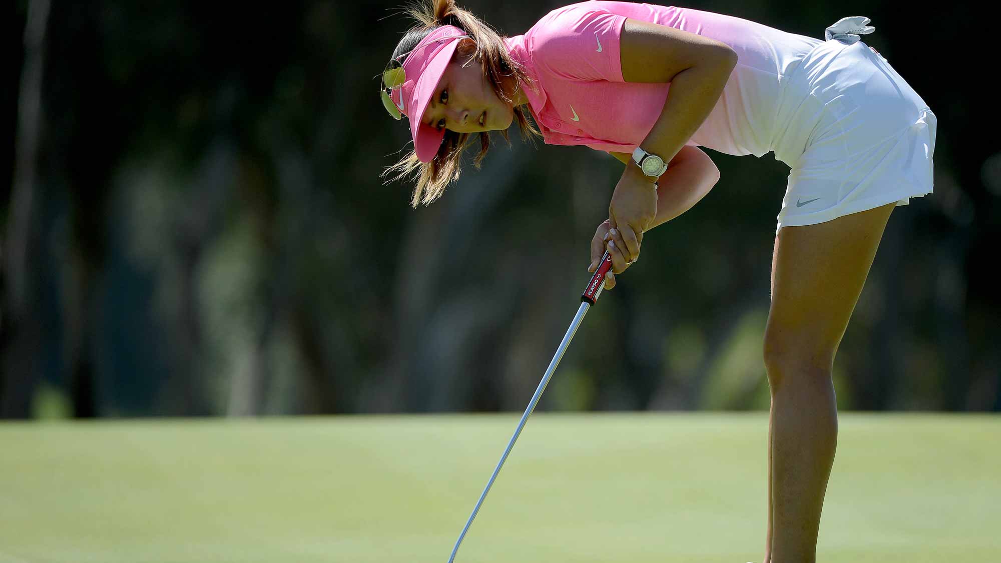 Michelle Wie hits a putt on the 10th green during Final Round of the LPGA KIA Classic at the Aviara Golf Club