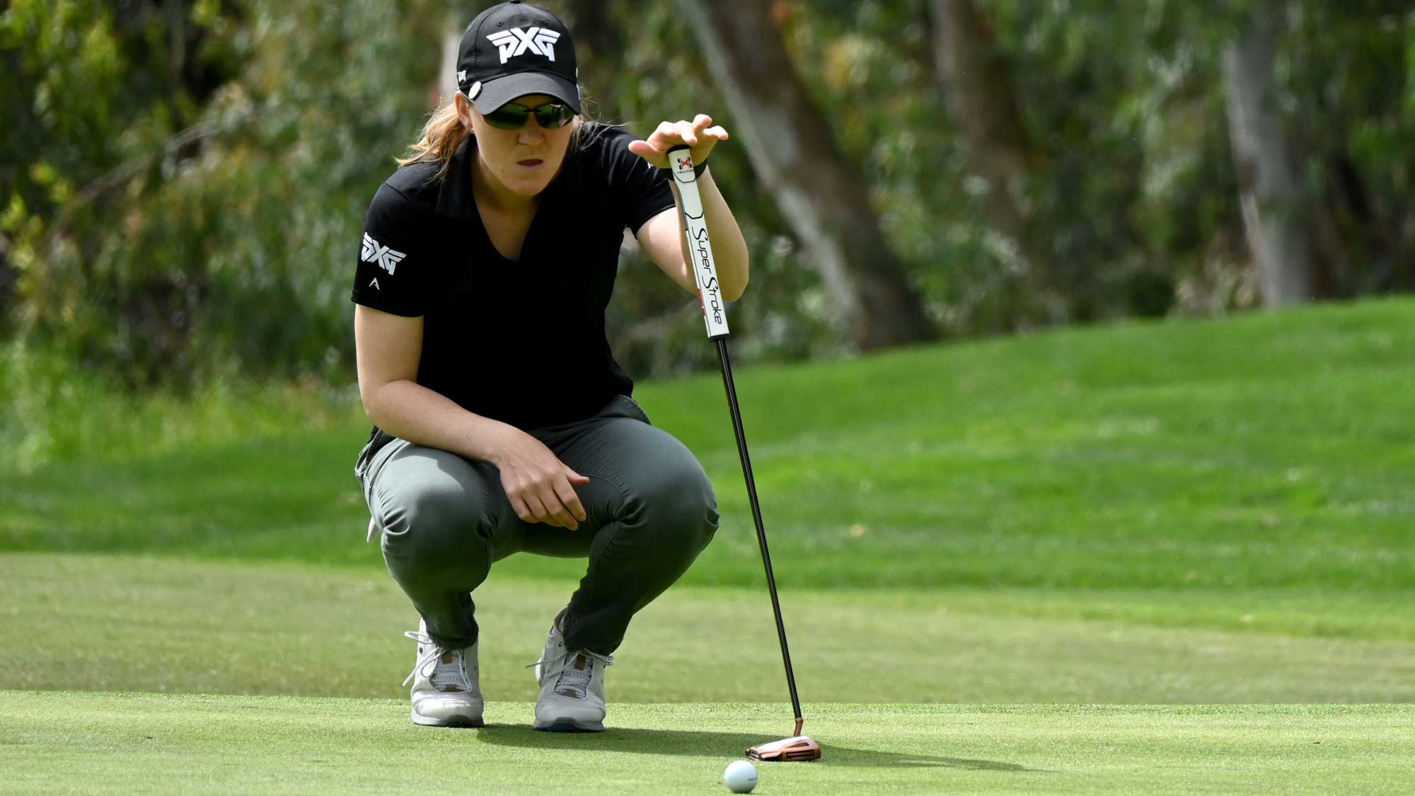 Austin Ernst lines up her putt on the 4th green during the Round Two of the KIA Classic at the Aviara Golf Club on March 26, 2021 in Carlsbad, California.