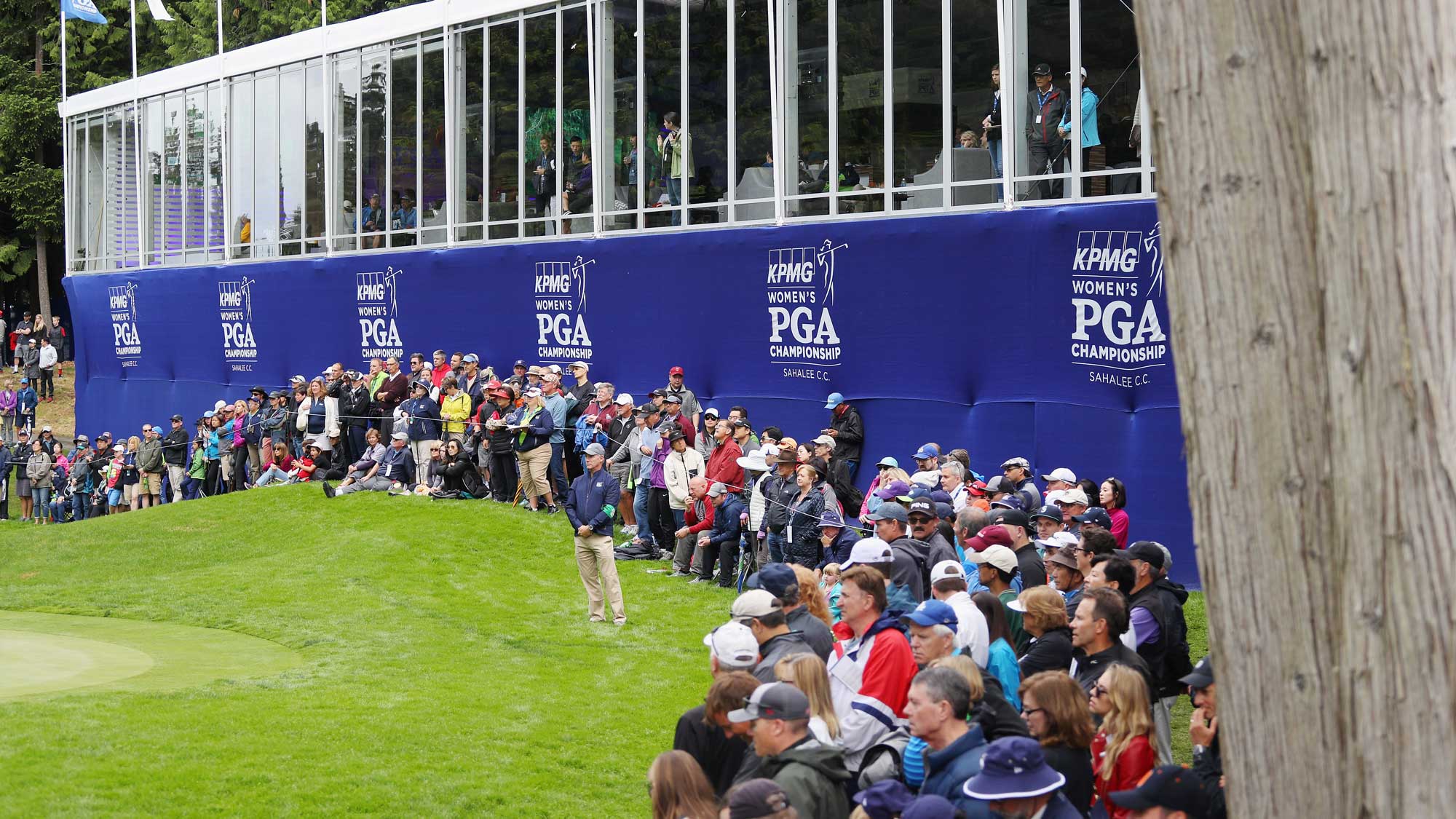 Fans watch the play on the 18th hole during the third round of the KPMG Women's PGA Championship
