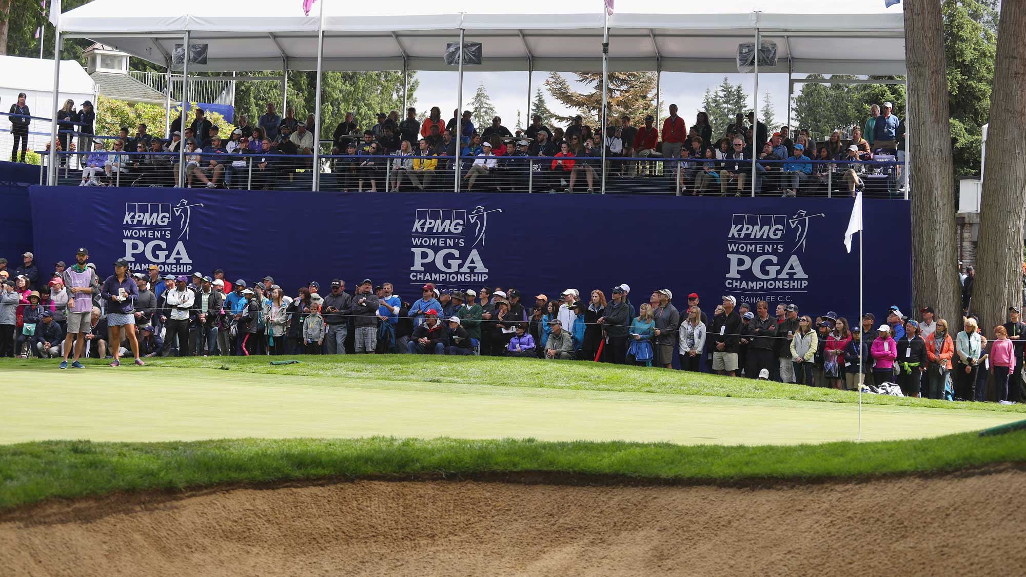 Fans watch the play on the 18th hole during the third round of the KPMG Women's PGA Championship