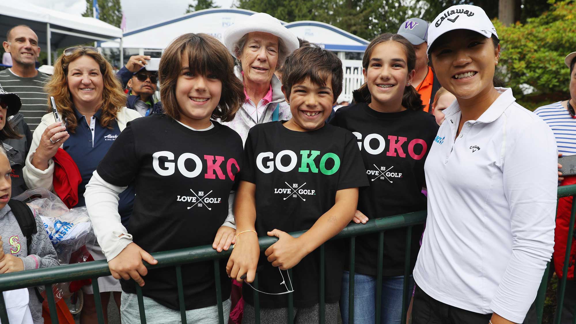 Lydia Ko of New Zealand poses with fans after the third round of the KPMG Women's PGA Championship 