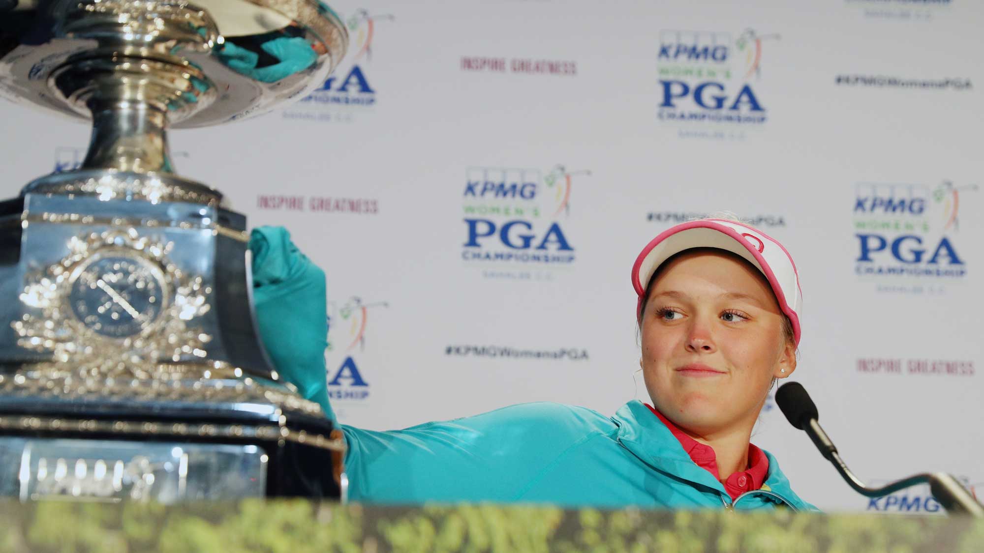 Brooke Henderson of Canada poses with the trophy after winning the KPMG Women's PGA Championship 