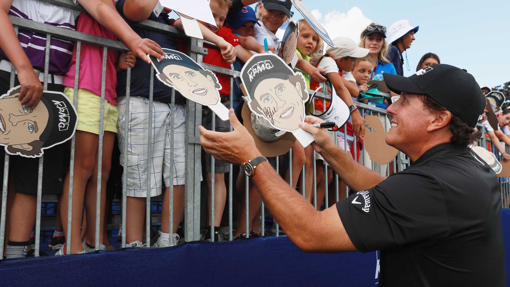 Phil Mickelson signs autographs for fans during a skills challenge prior to the start of the 2017 KPMG Women's PGA Championship