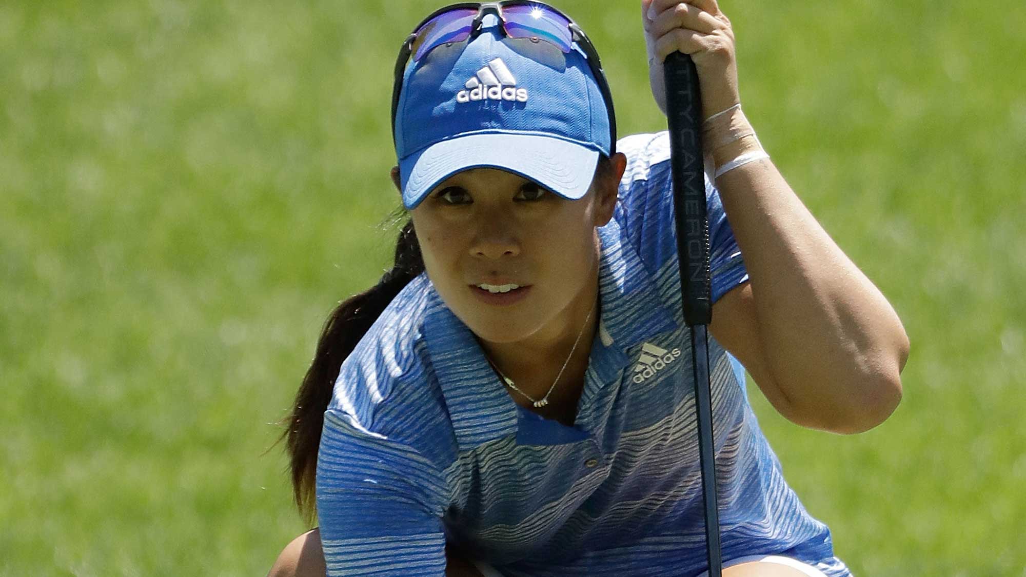 Danielle Kang lines up a putt on the fourth green during the final round of the 2017 KPMG PGA Championship 