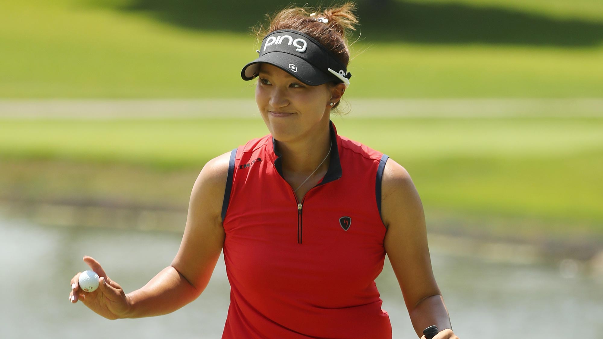 Annie Park waves to fans after a birdie on the third green during the third round of the 2018 KPMG Women's PGA Championship