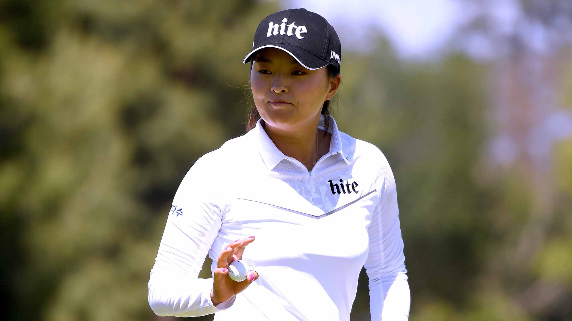 Jin Young Ko of South Korea reacts to her par saving putt on the sixth green during round three of the Hugel-JTBC LA Open at the Wilshire Country Club on April 21, 2018 in Los Angeles, California
