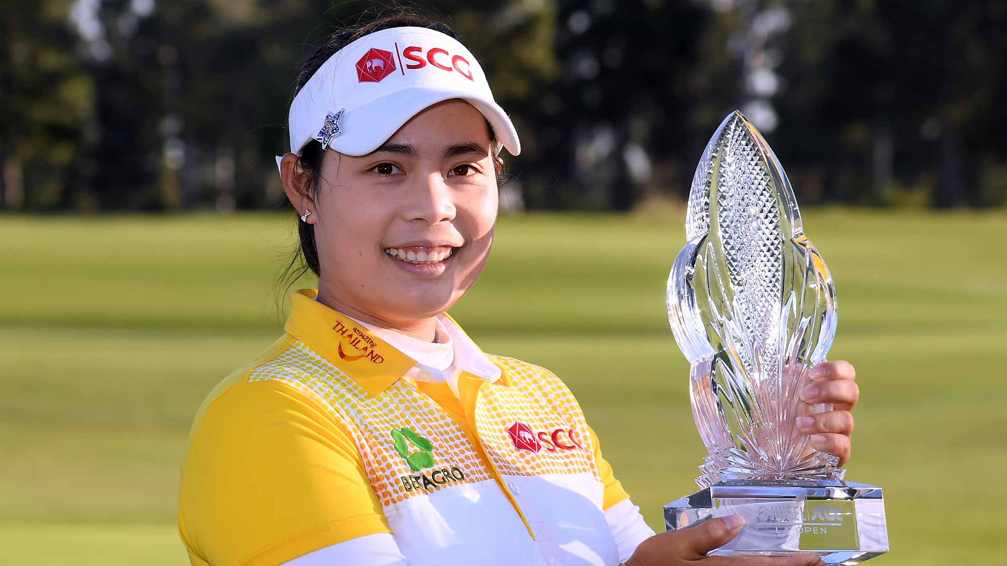 Moriya Jutanugarn of Thailand poses with the trophy after her win during round four of the Hugel-JTBC LA Open at the Wilshire Country Club on April 22, 2018 in Los Angeles, California